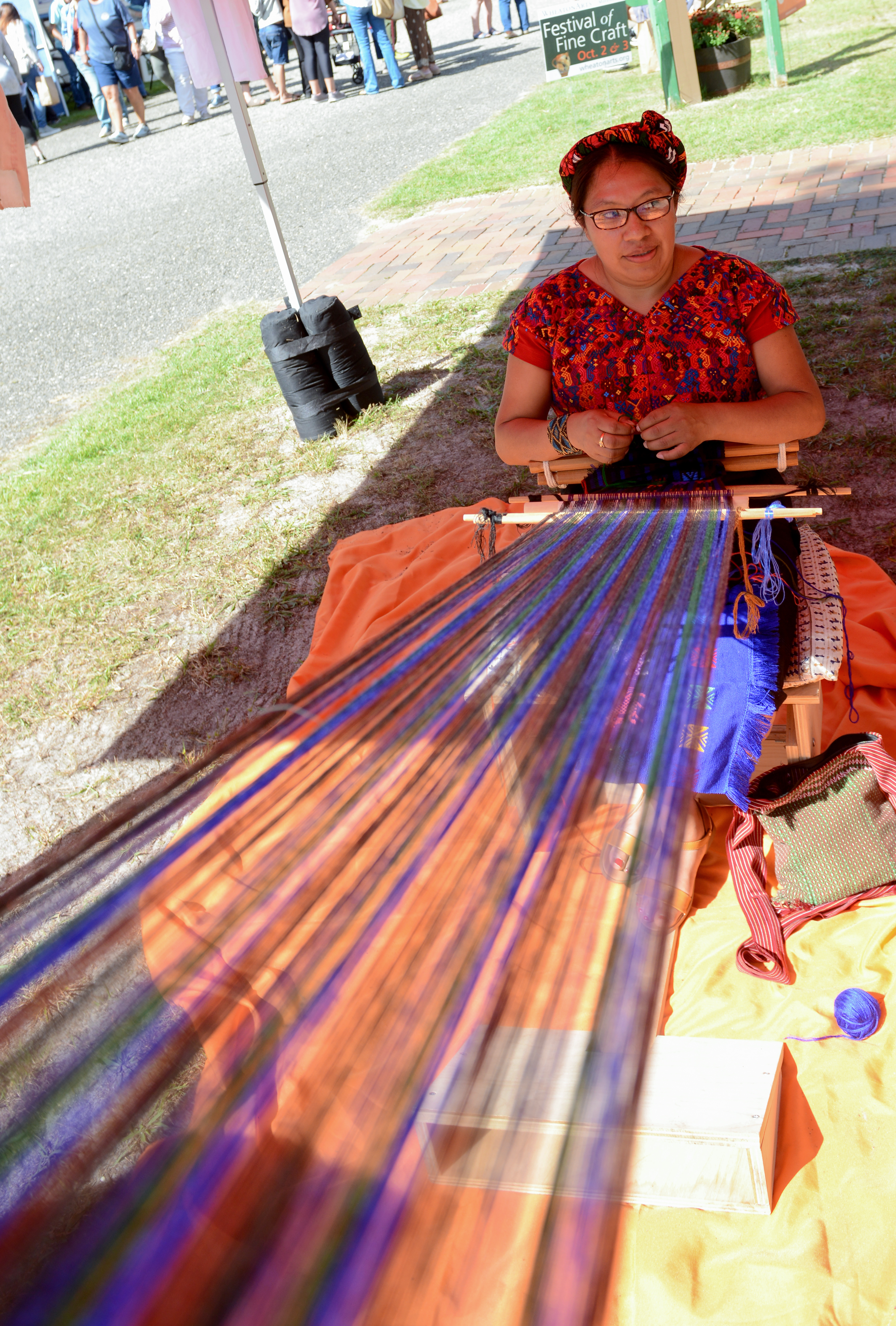 Guatemalan master weaver Angélica López demonstrates a backstop loom technique during the 22nd annual Festival of Fine Craft at Wheaton Arts in Millville, Saturday, Oct. 2, 2021.