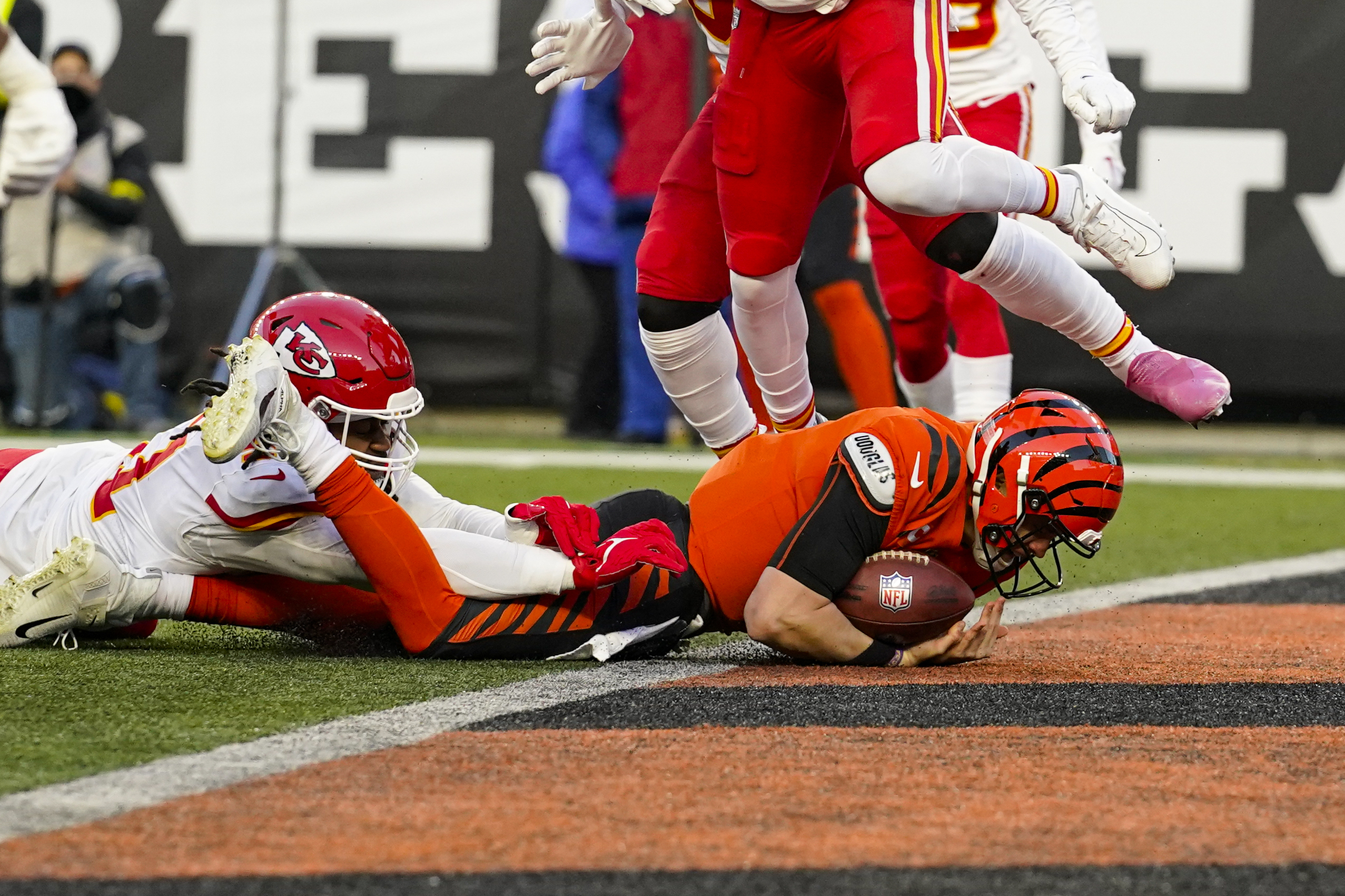 Cincinnati Bengals defensive end Sam Hubbard (94) celebrates with DJ Reader  (98) after making a sack during an NFL football game against the Kansas  City Chiefs, Sunday, Dec. 4, 2022, in Cincinnati. (