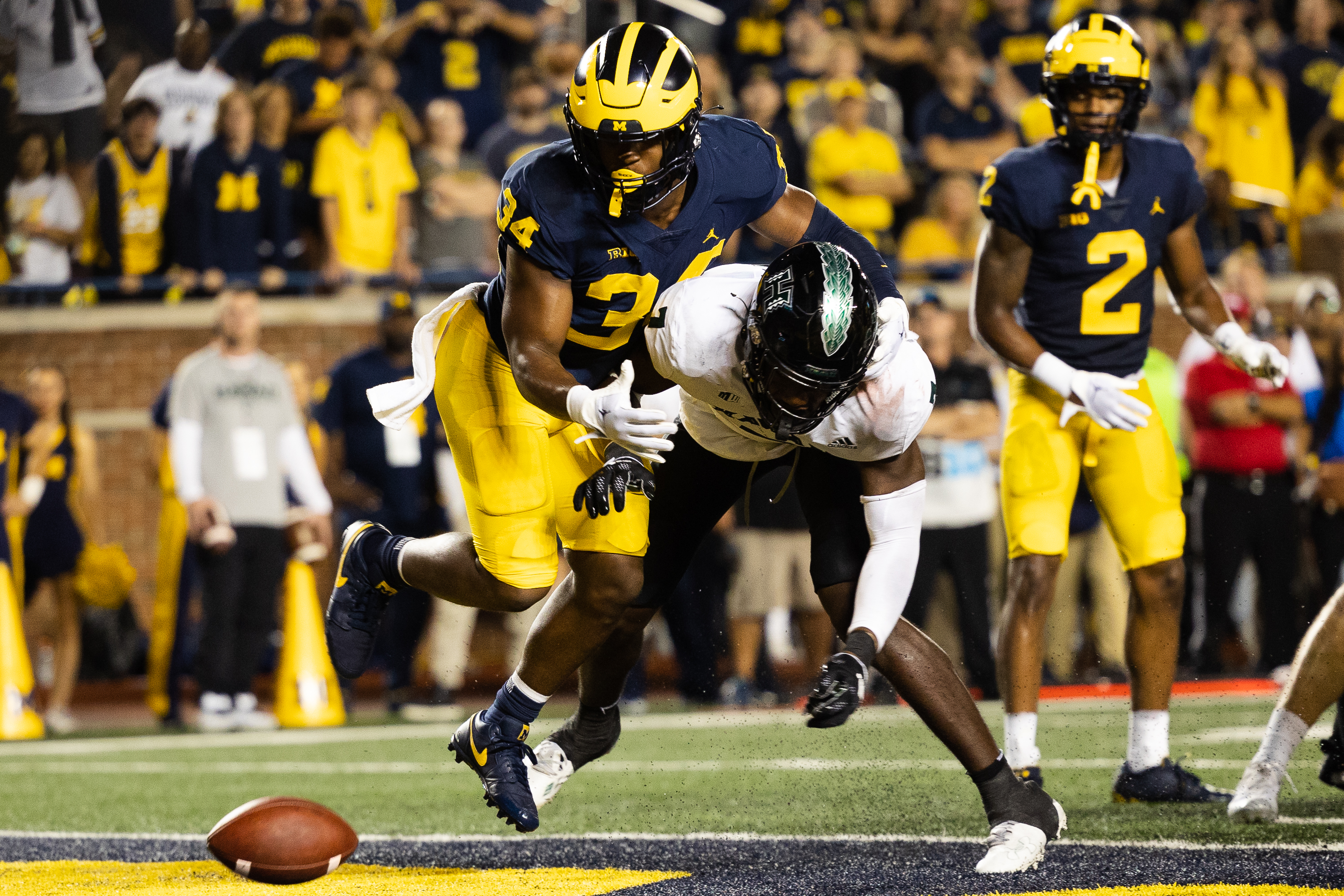 Michigan defensive back Lavert Hill (24) commits pass interference on Army  wide receiver Camden Harrison (88) in the second quarter of an NCAA  football game in Ann Arbor, Mich., Saturday, Sept. 7