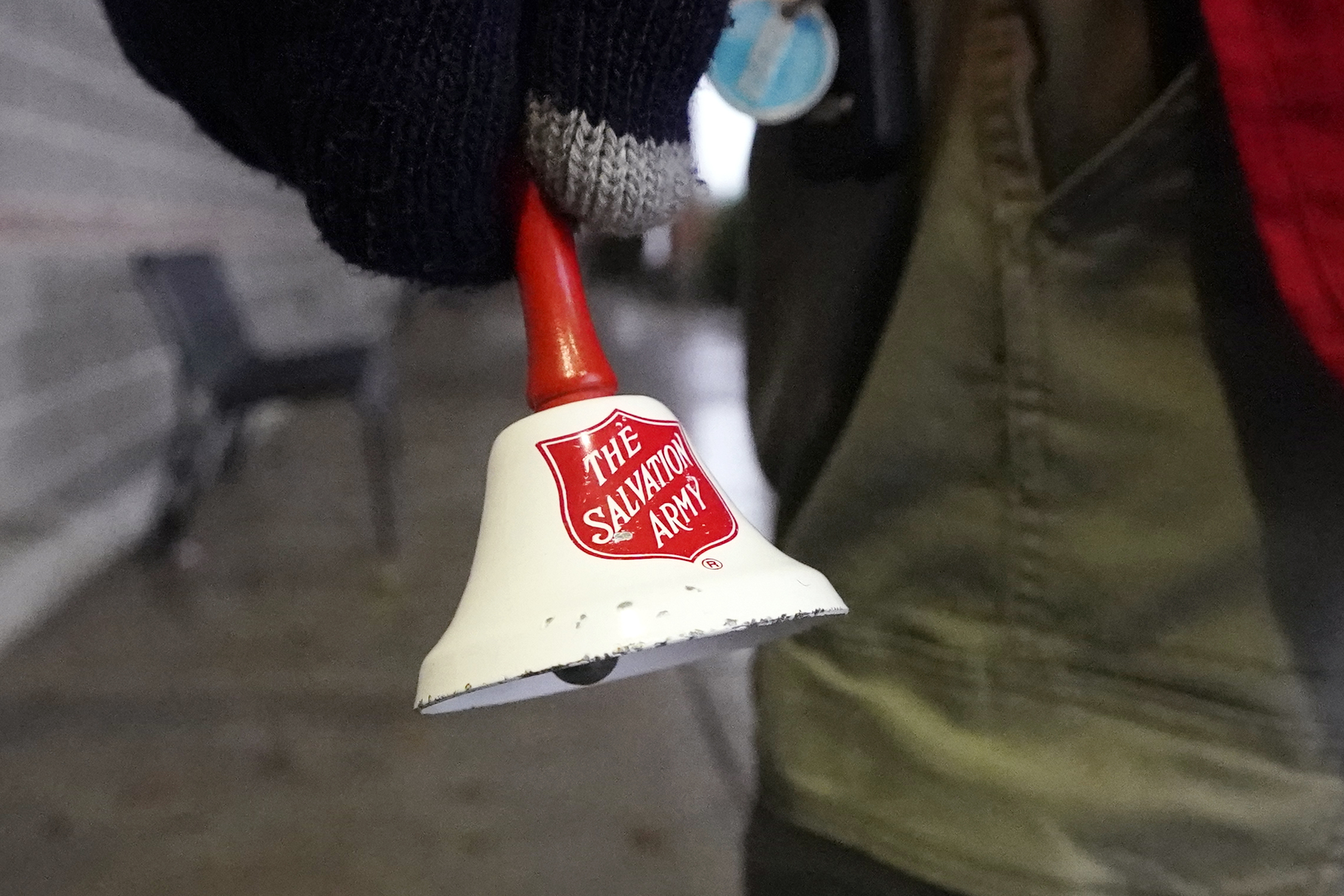 The Salvation Army's red kettle bells ring outside Kroger this holiday  season