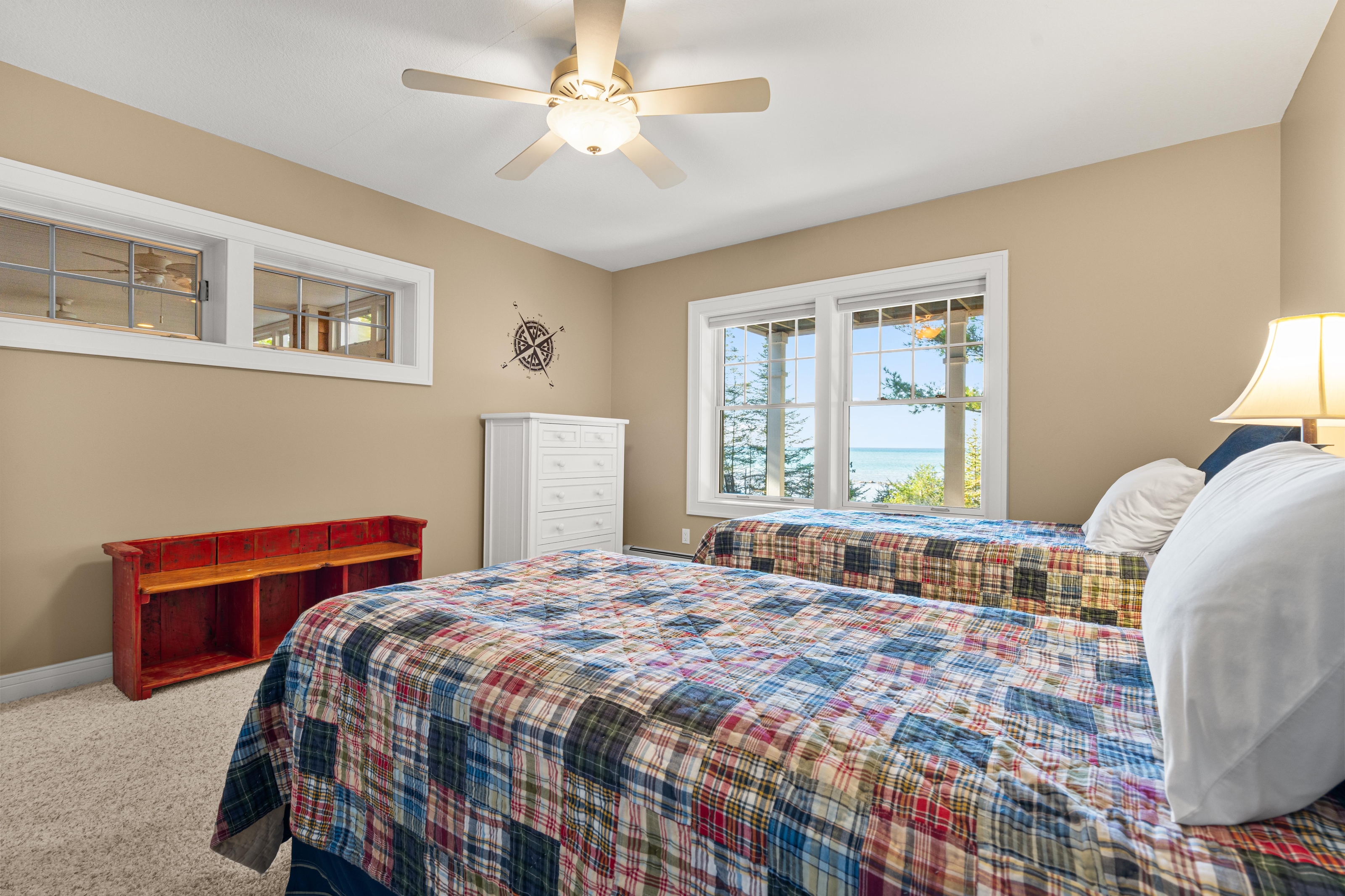 Interior photographs of 4093 Lake Shore Drive in Charlevoix, this gem is listed at $2,099,900 through Berkshire Hathaway HomeServices Michigan Real Estate – Traverse City and The Crane Group with associate broker Johnny Crane and his brother, co-listing agent Matt Crane.