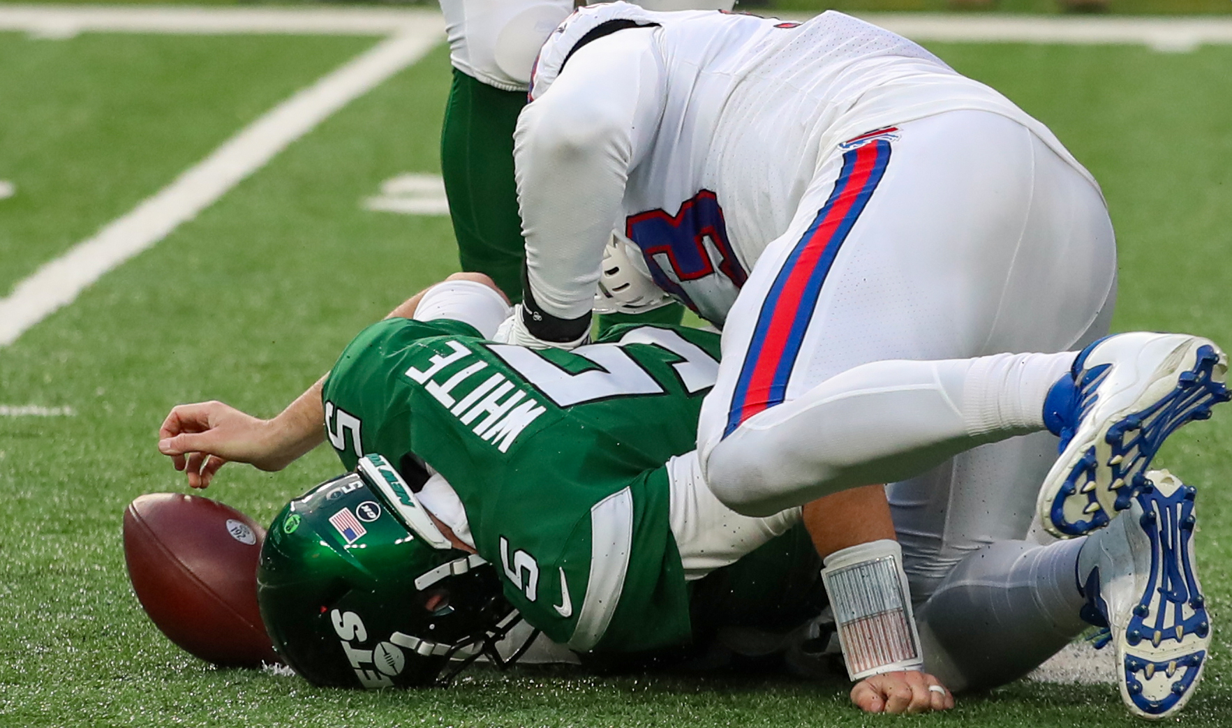 Buffalo Bills defensive end Efe Obada (93) reacts after sacking New York  Jets quarterback Mike White (