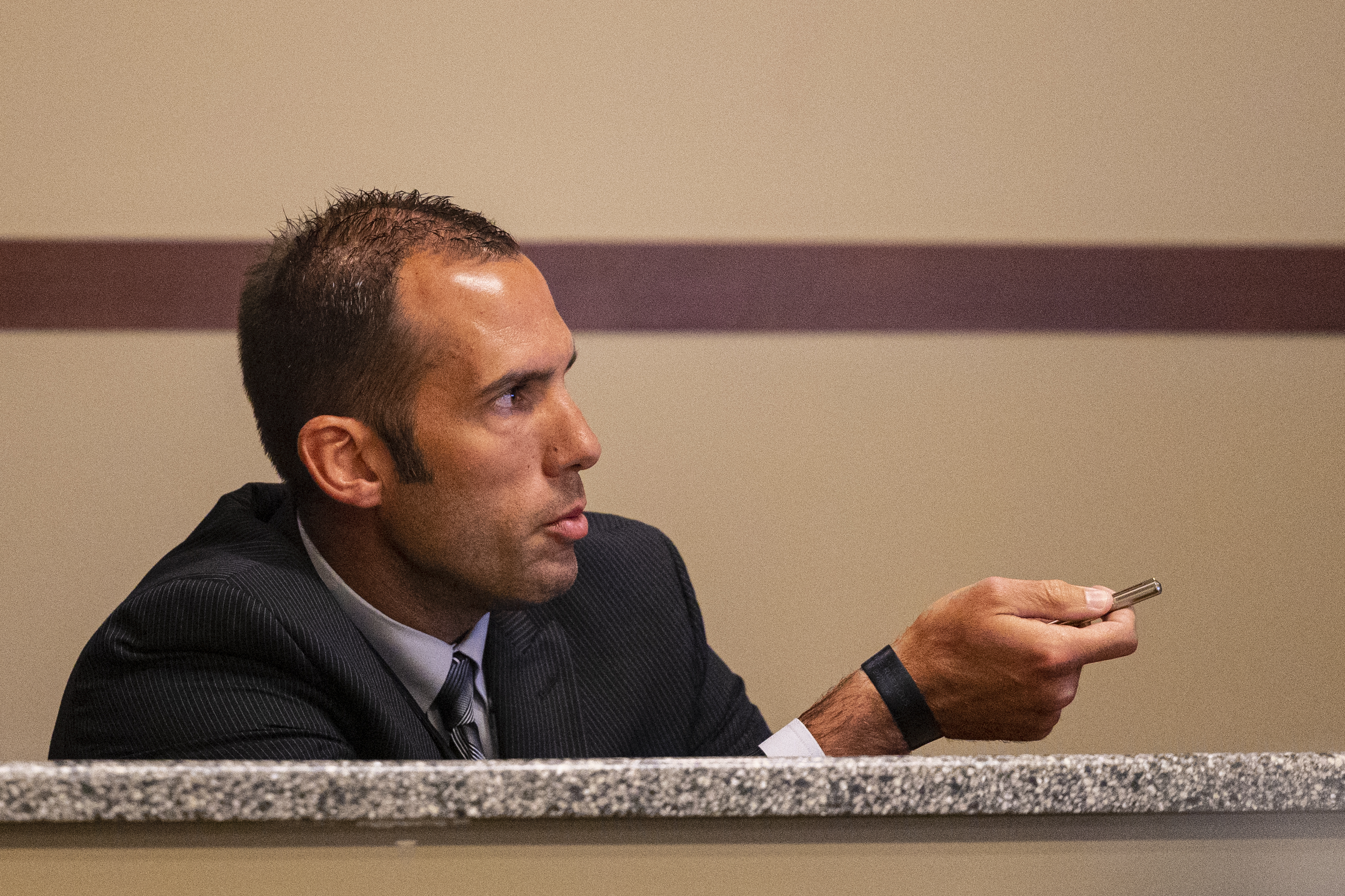 Kent County Sheriff Detective Dustin Cook testifies during the preliminary examination for (not pictured) Rishy Manning, 22, Javonte Rosa, 23 and Jaheim Hayes-Goree, 20, at the 63rd District Courthouse in Grand Rapids, Michigan on Thursday, June 30, 2022. The trio of defendants who appeared in court, are charged with felony murder in the shooting death of Joseph Wilder, 50, who was shot and killed during a robbery attempt at a Huntington Bank ATM on South Division Avenue in May of 2022. (Joel Bissell | MLive.com)