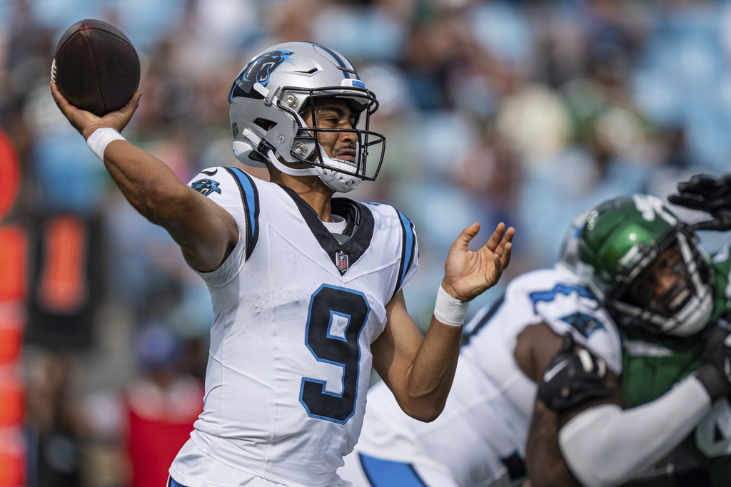 Carolina Panthers quarterback Bryce Young (9) drops back to pass during an  NFL preseason football game against the New York Jets, Saturday, Aug. 12,  2023, in Charlotte, N.C. (AP Photo/Brian Westerholt Stock