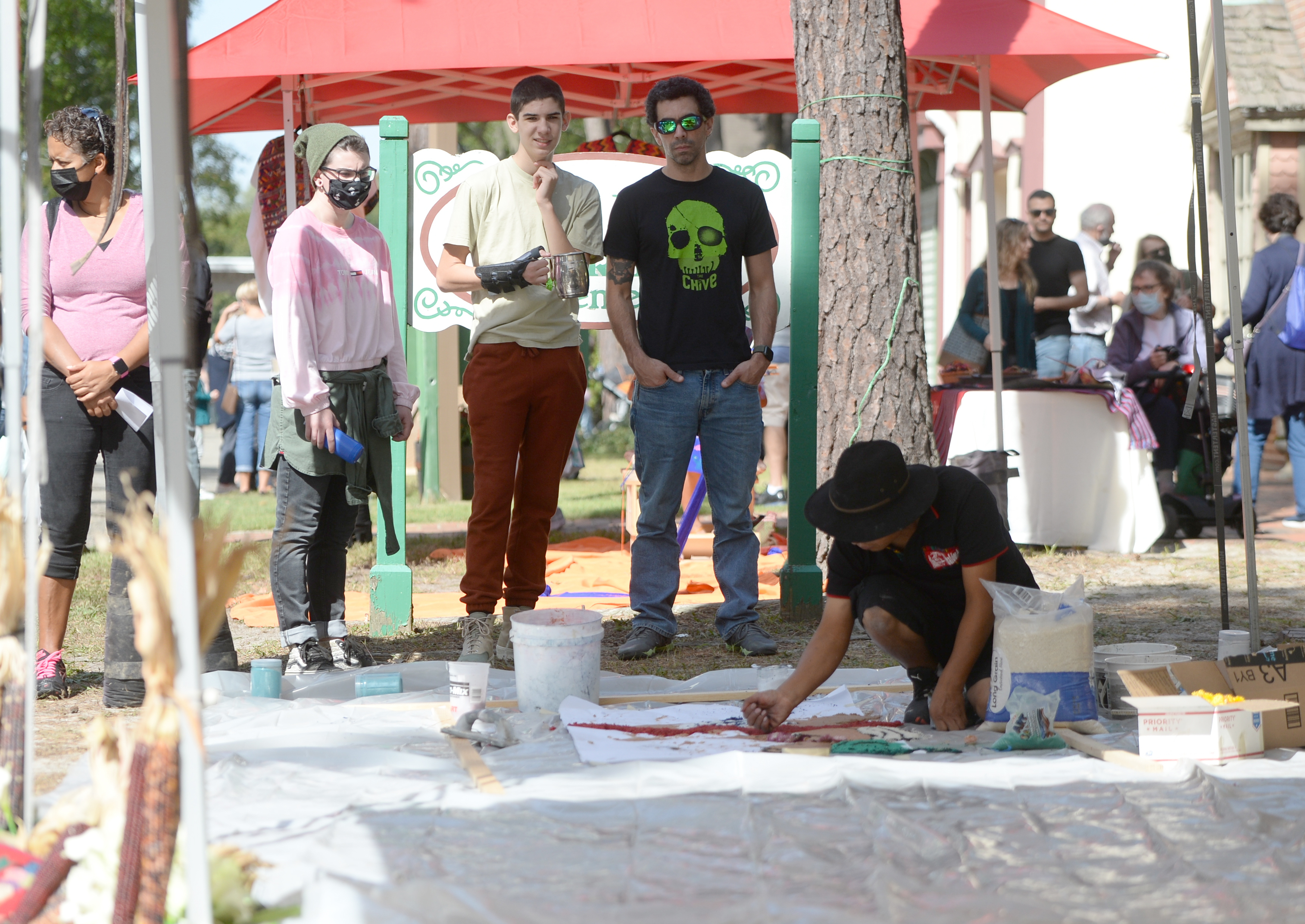 Guatemalan artist Ubaldo Sánchez creates a sawdust carpet during the 22nd annual Festival of Fine Craft at Wheaton Arts in Millville, Saturday, Oct. 2, 2021.