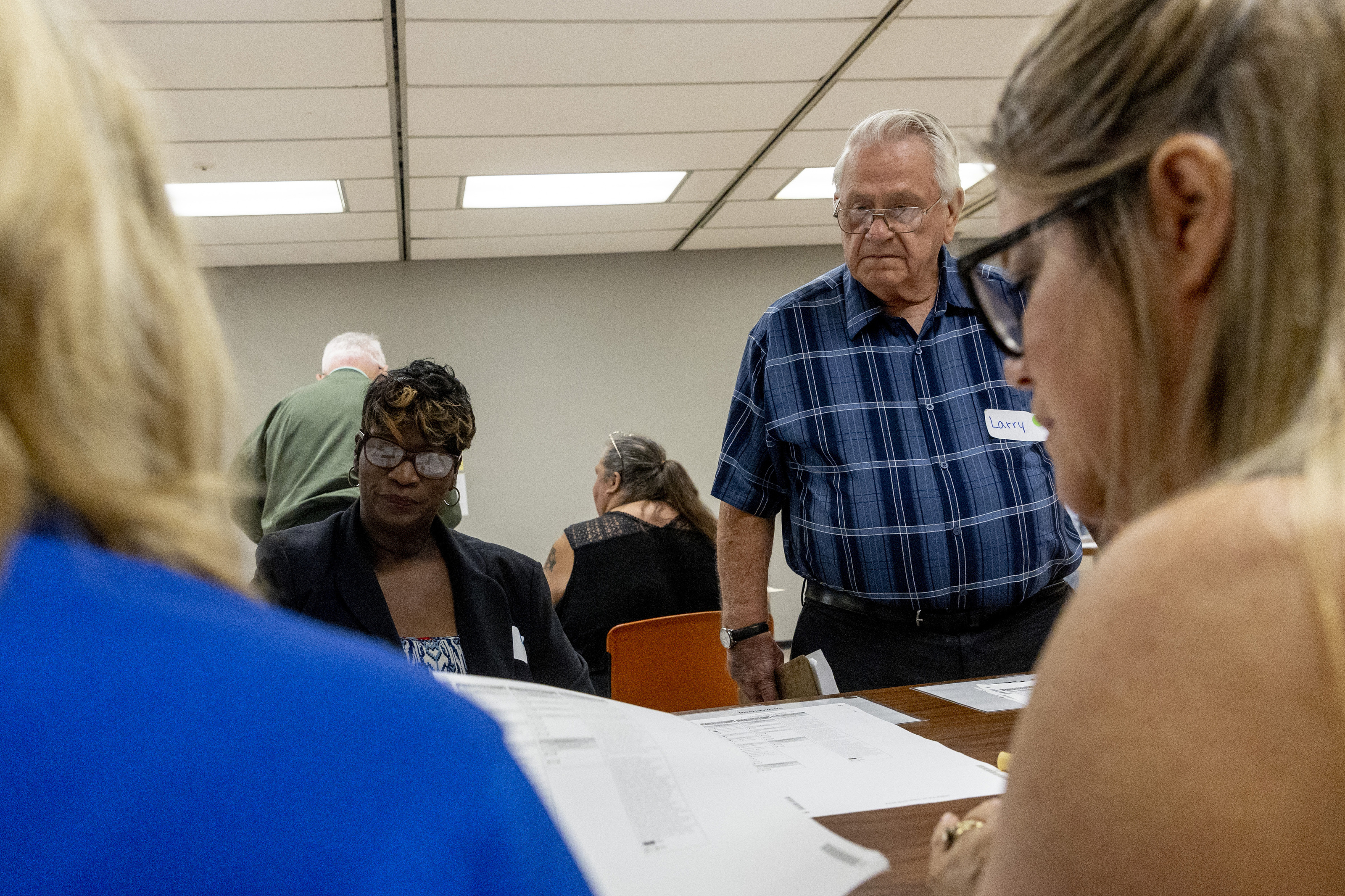 Election workers recount votes for two Genesee County ballots - mlive.com