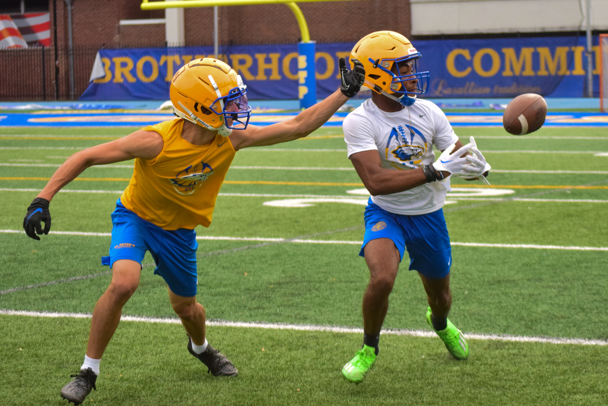 Brighton High School football team practices, preparing for the season