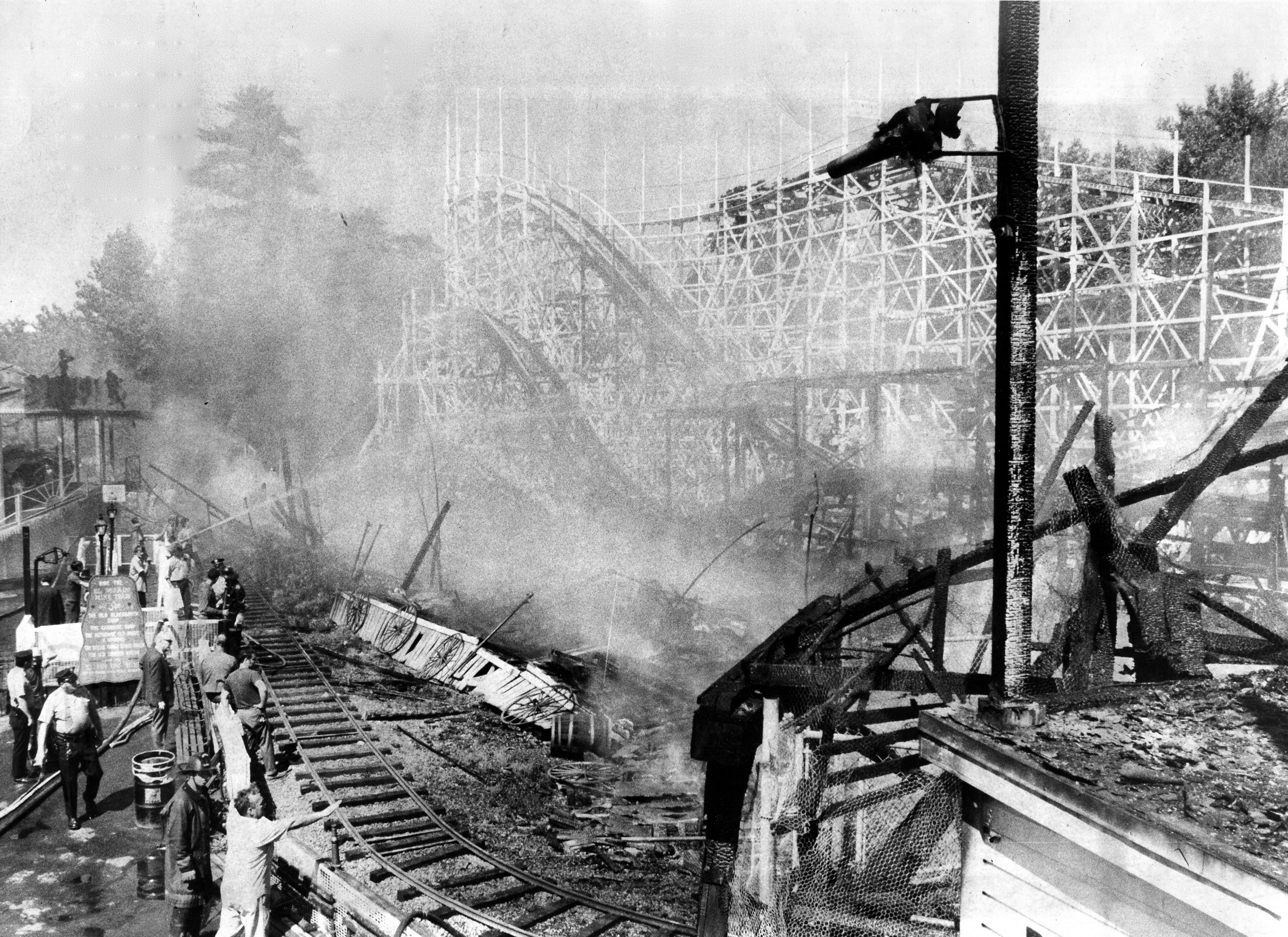 Sept. 1, 1971 - Agawam - Smoke rises from what used to be the El Dorado Mine Train Ride at Riverside Park. The fire destroyed the ride and put the adjacent roller coaster out of commission. (Republican file photo) Staff-Shot
