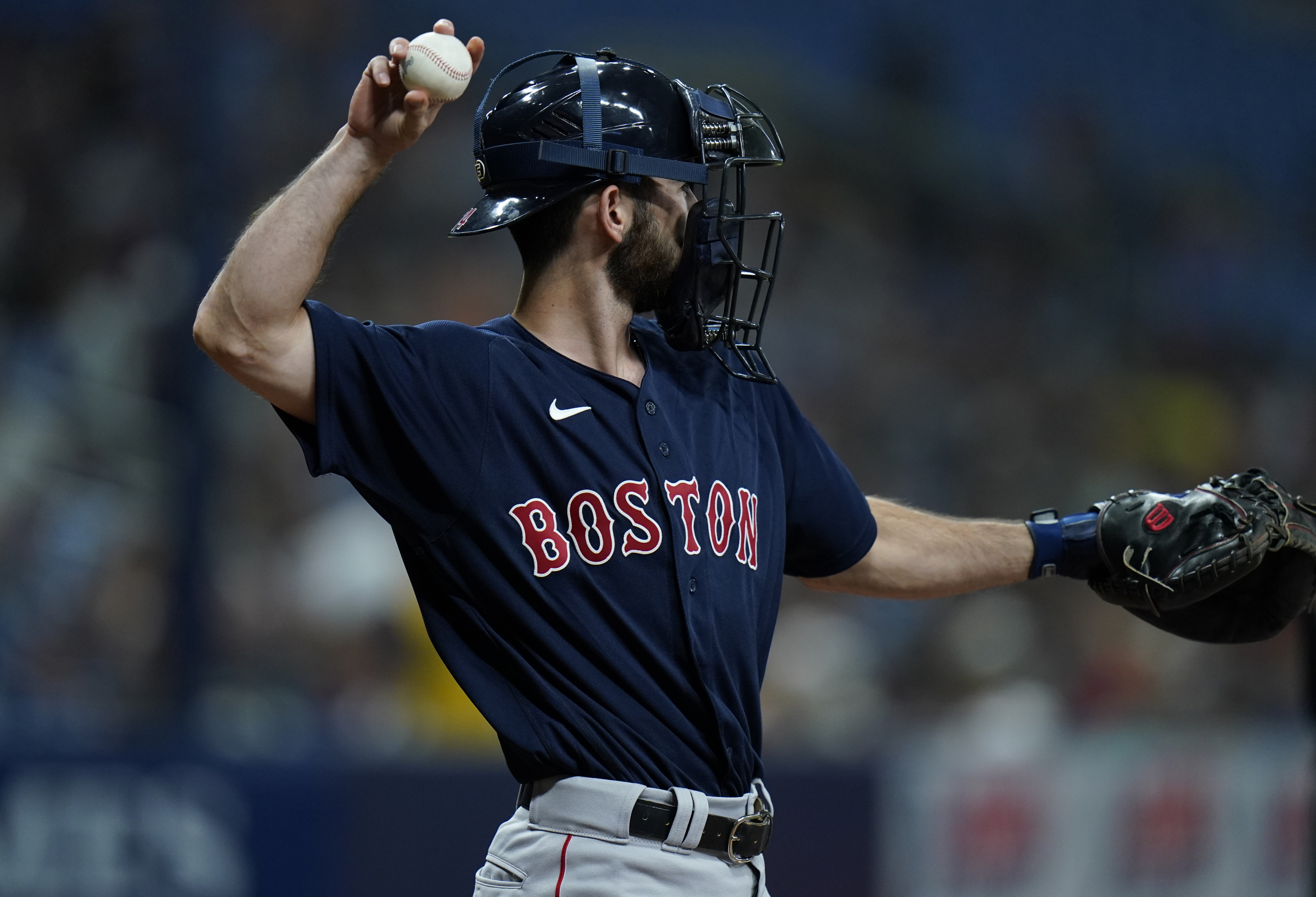 Boston Red Sox catcher Connor Wong makes a throw in a baseball