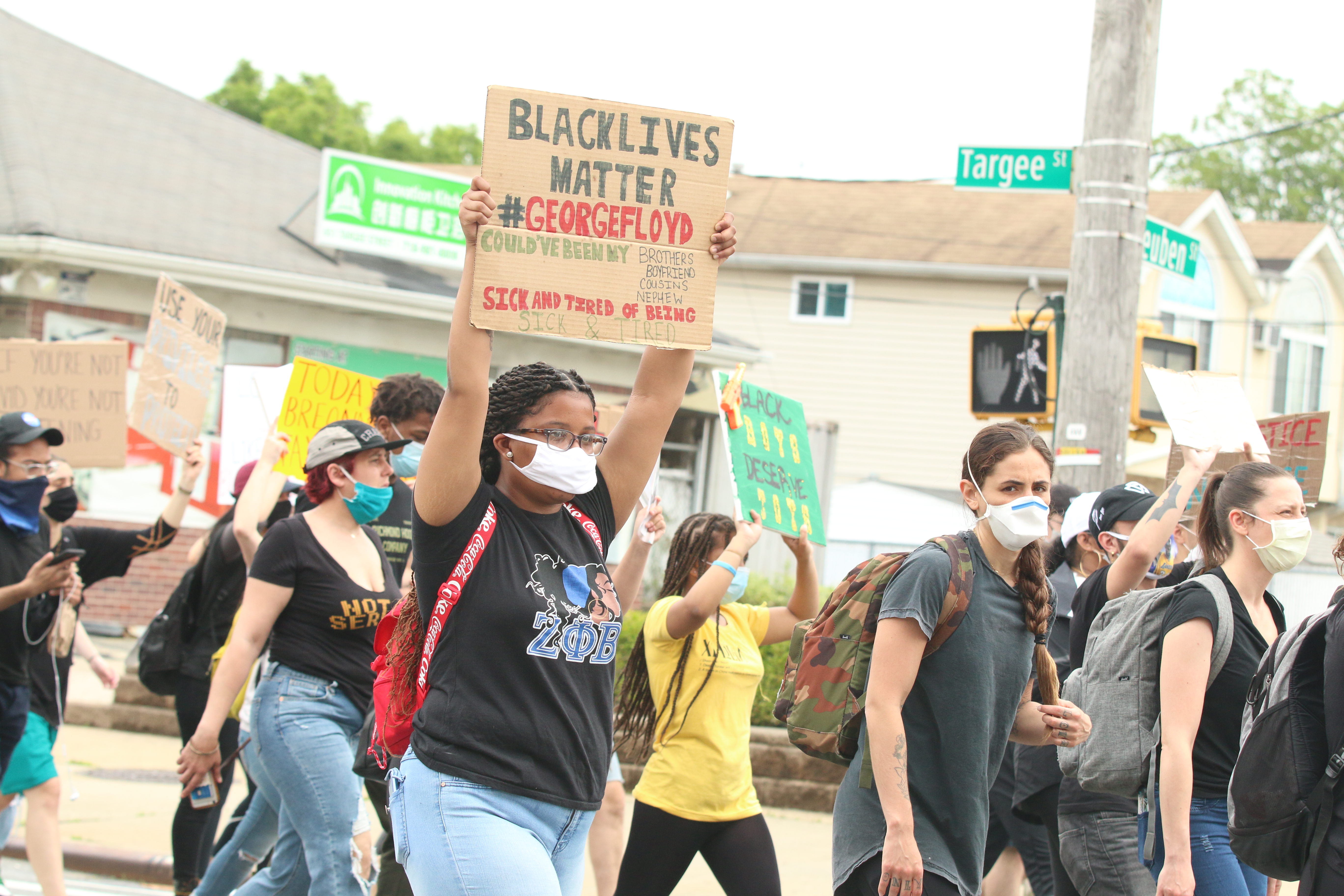 Protesters march to the 122 precinct through Dongan Hills along Richmond Road.  (Staten Island Advance/Jan Somma-Hammel)