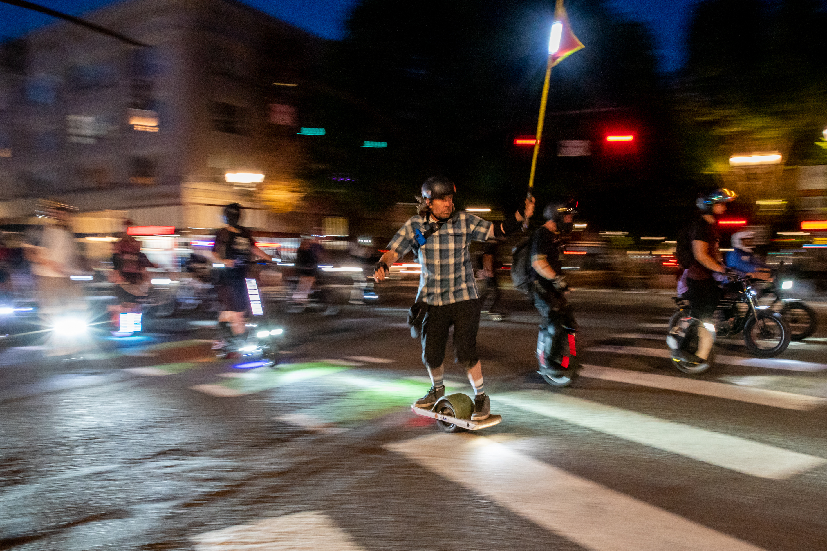 Did you spot a parade of electric unicycles? It's Portland's weekly Friday  Night Ride – Here is Oregon 