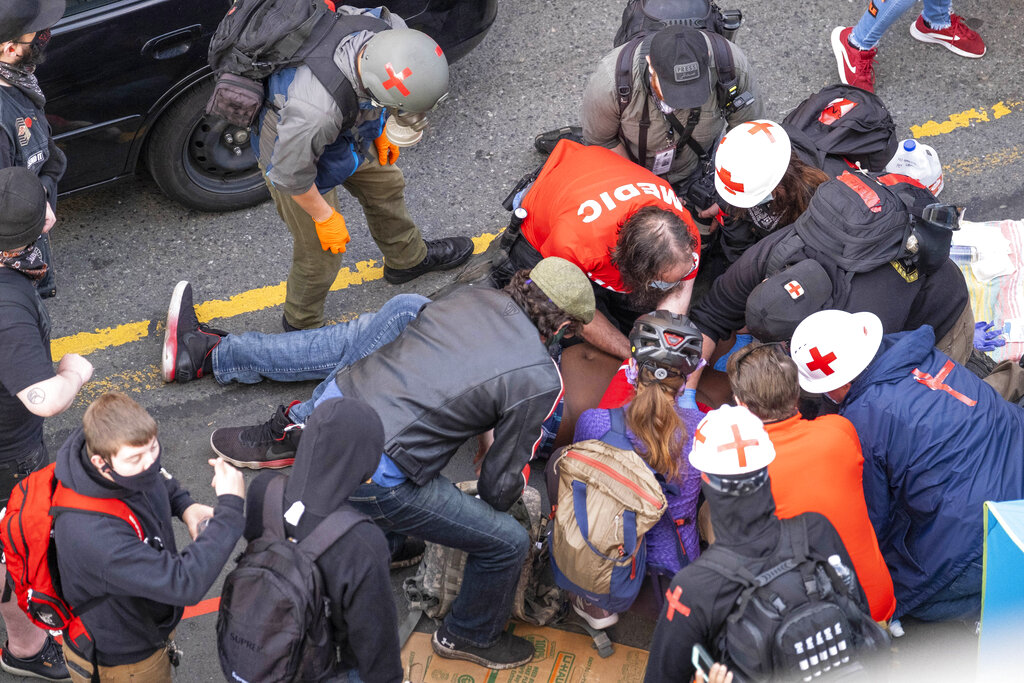 Man Drives Car At Seattle Protesters, Exits Brandishing Gun; 1 Person ...