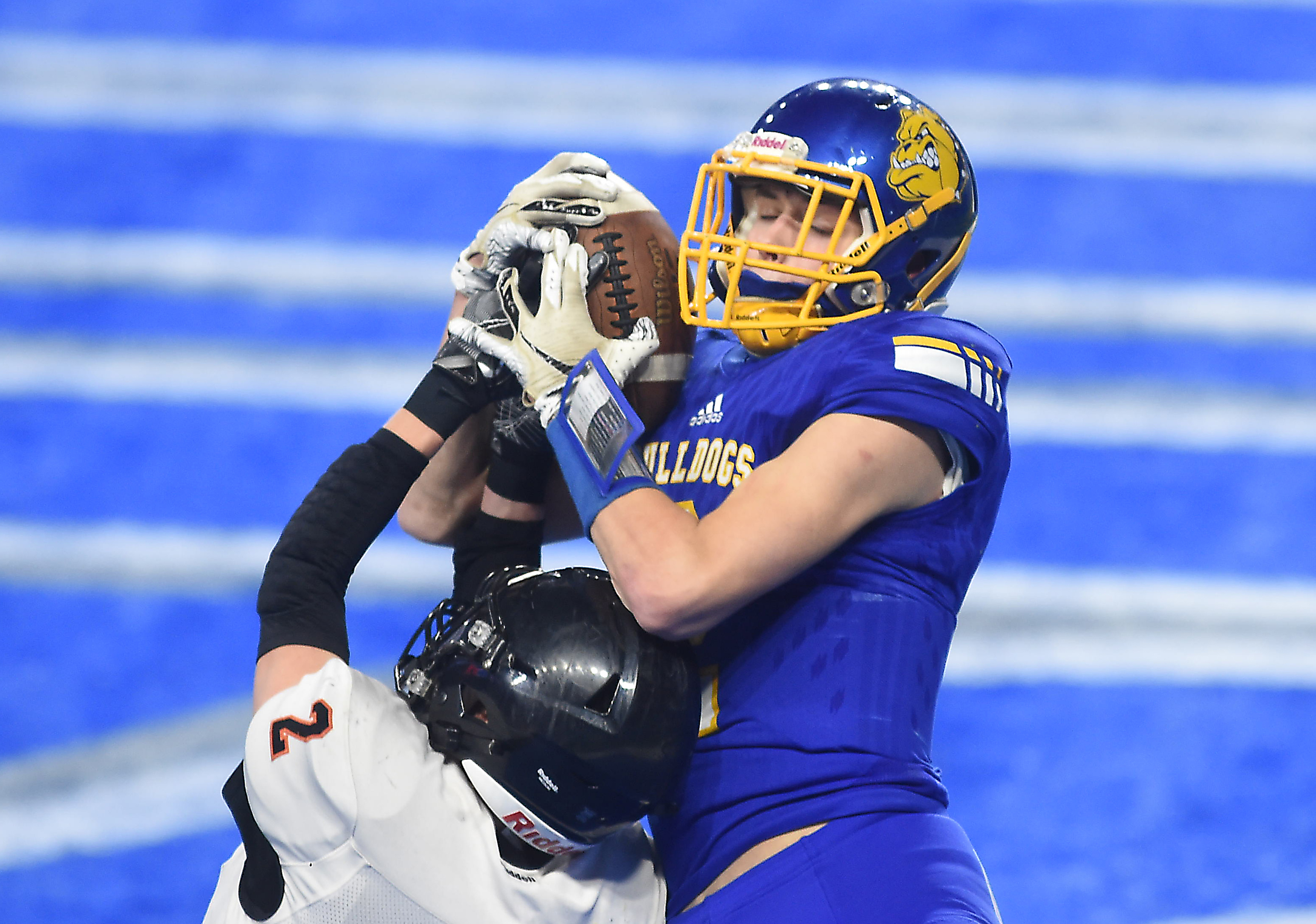 Who has the coolest football helmet in the Ann Arbor area? MLive