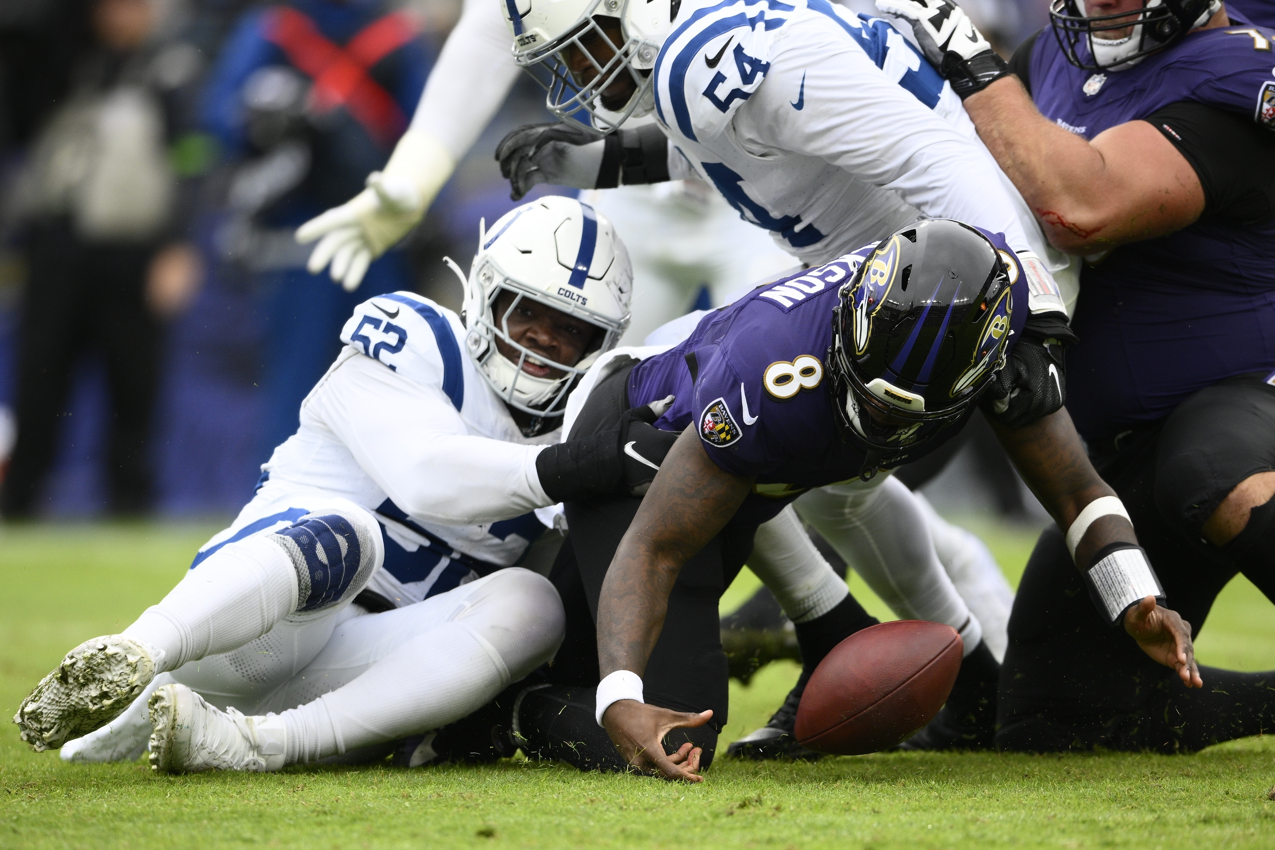 Baltimore Ravens quarterback Lamar Jackson (8) looks for an open receiver  during an NFL football game against the Tampa Bay Buccaneers, Thursday,  Oct. 27, 2022 in Tampa, Fla. The Ravens defeat the