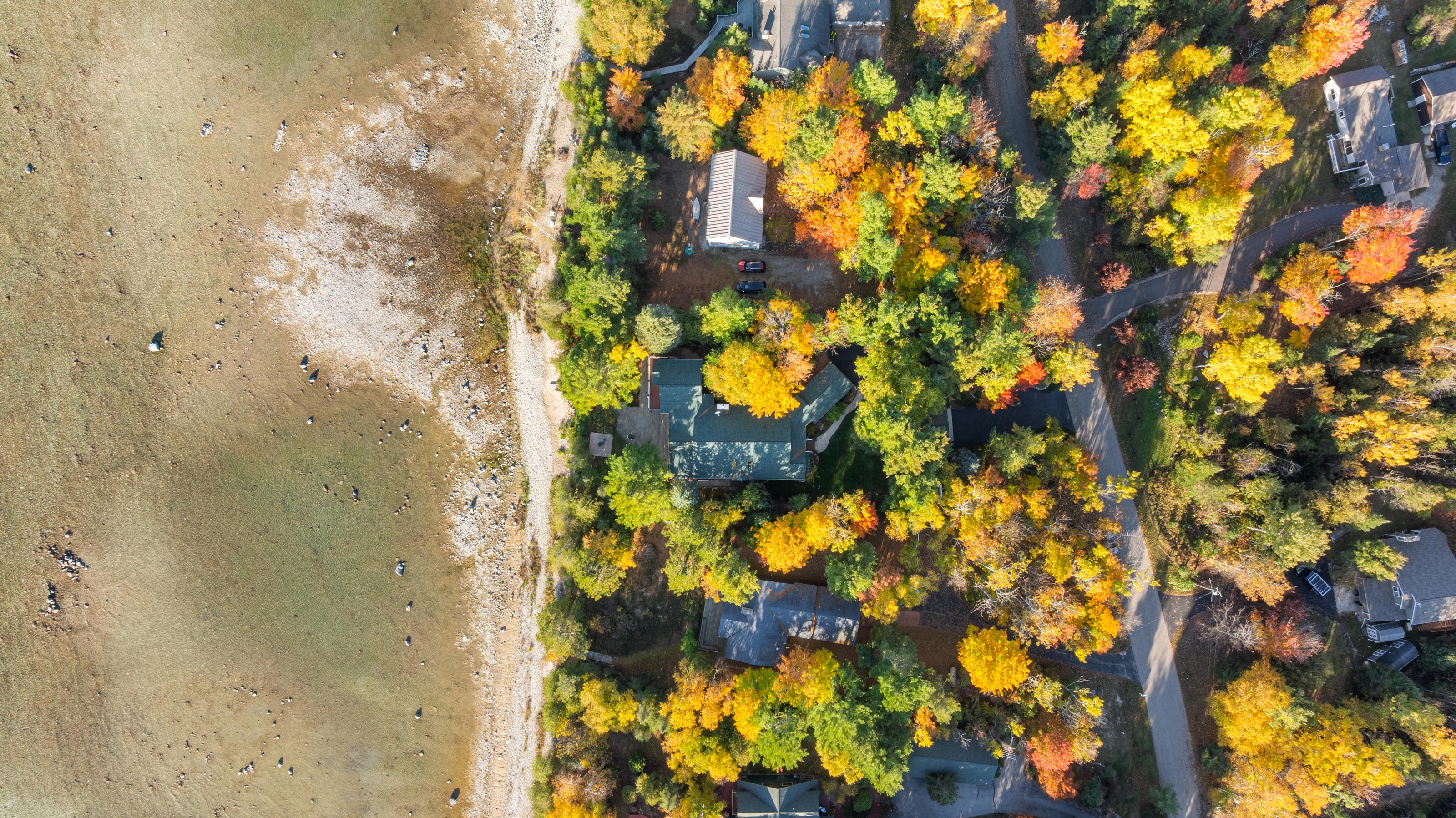 Aerial photographs of 4093 Lake Shore Drive in Charlevoix, this gem is listed at $2,099,900 through Berkshire Hathaway HomeServices Michigan Real Estate – Traverse City and The Crane Group with associate broker Johnny Crane and his brother, co-listing agent Matt Crane.