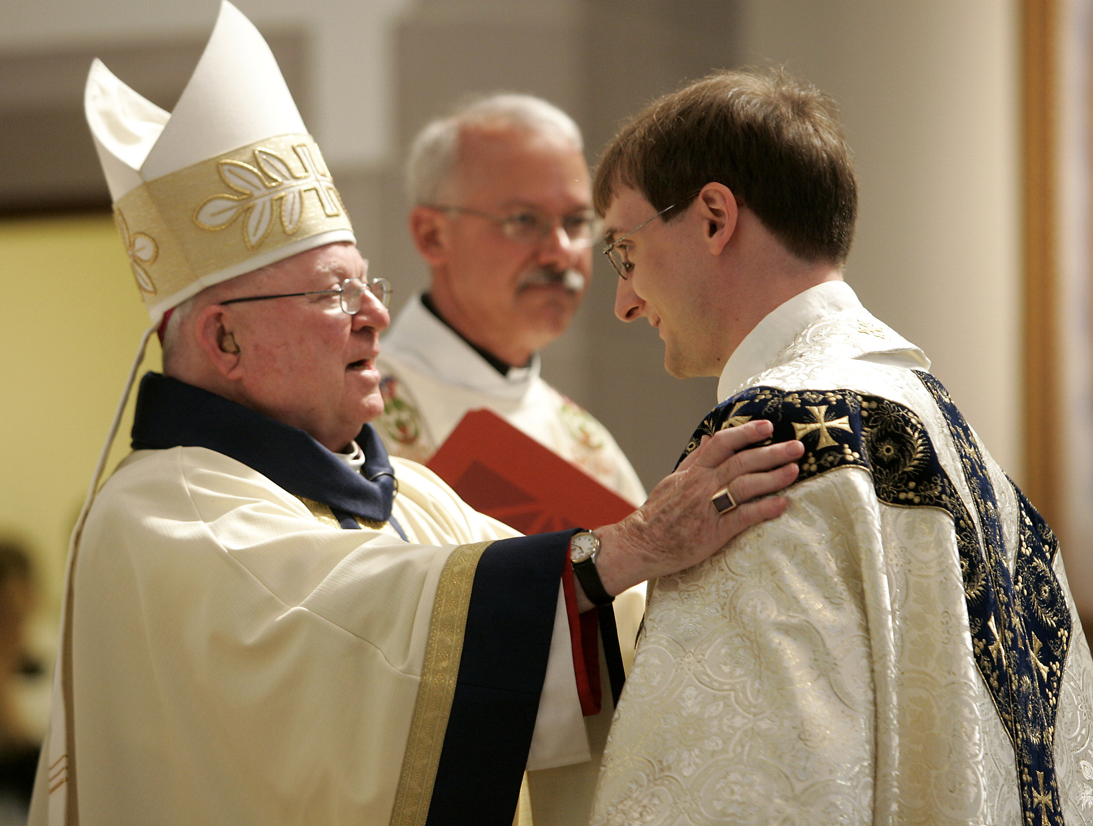 departing bishop sees a more united diocese murray is also happy about increase in number of priests here mlive com