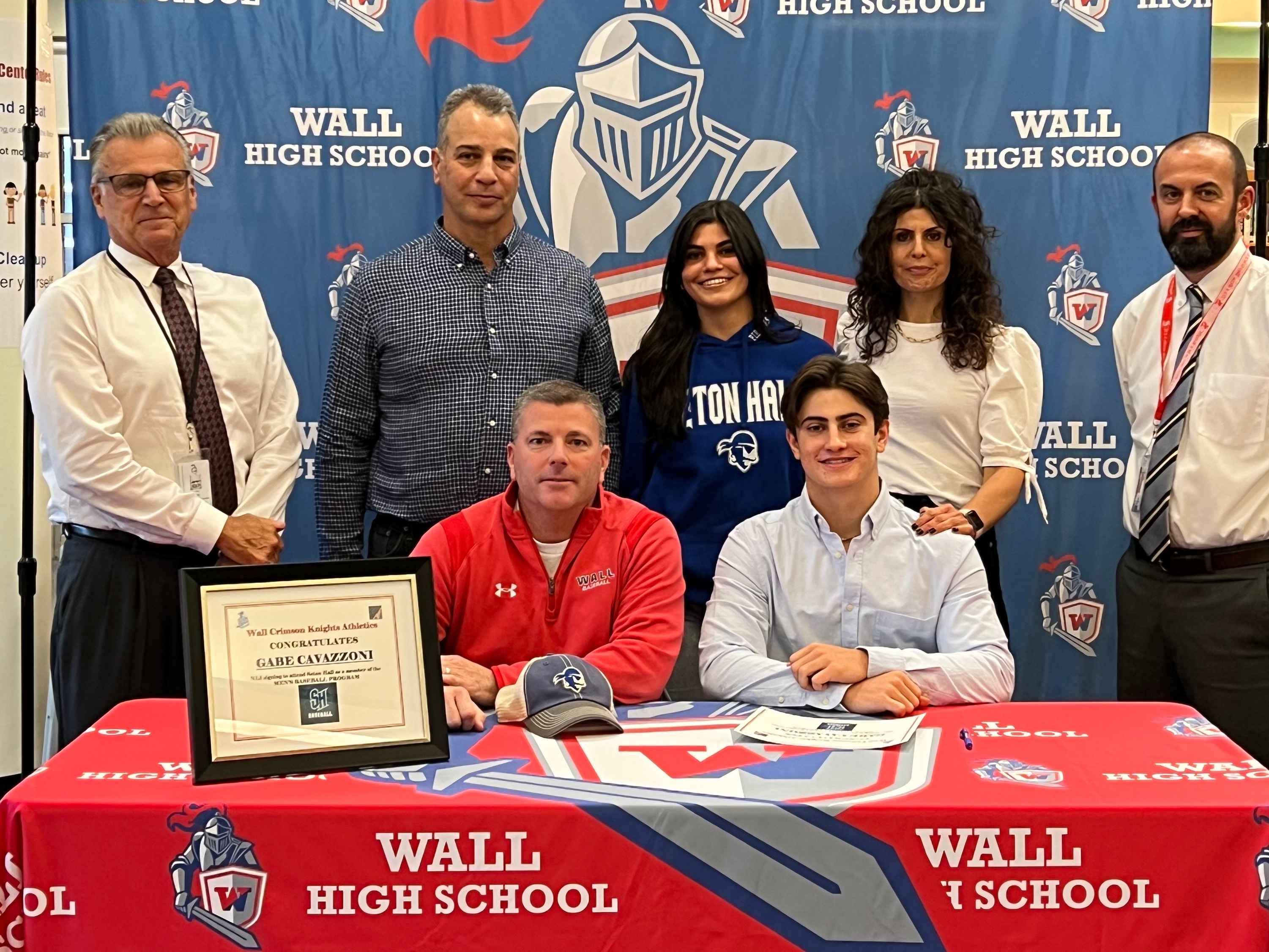 Bottom sitting, right-left, Gabe Cavazzoni & Wall head base coach James Rochford; Standing left to right, Wall HS Principal Dr. Pete Riggi, Dad, Sister, Mom, Kevin Davis Assistant Principal