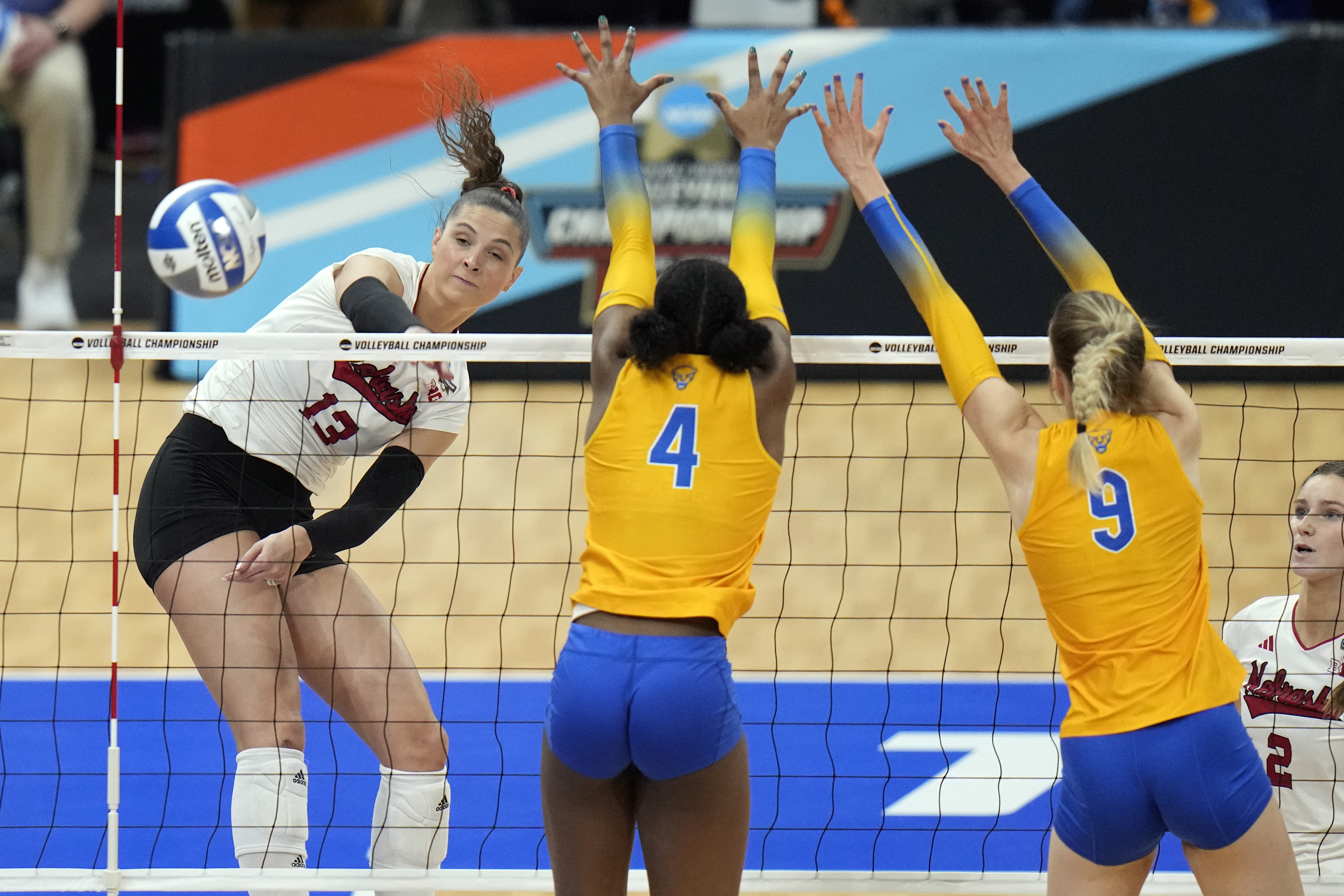 Division I women's volleyball championship sets attendance, TV