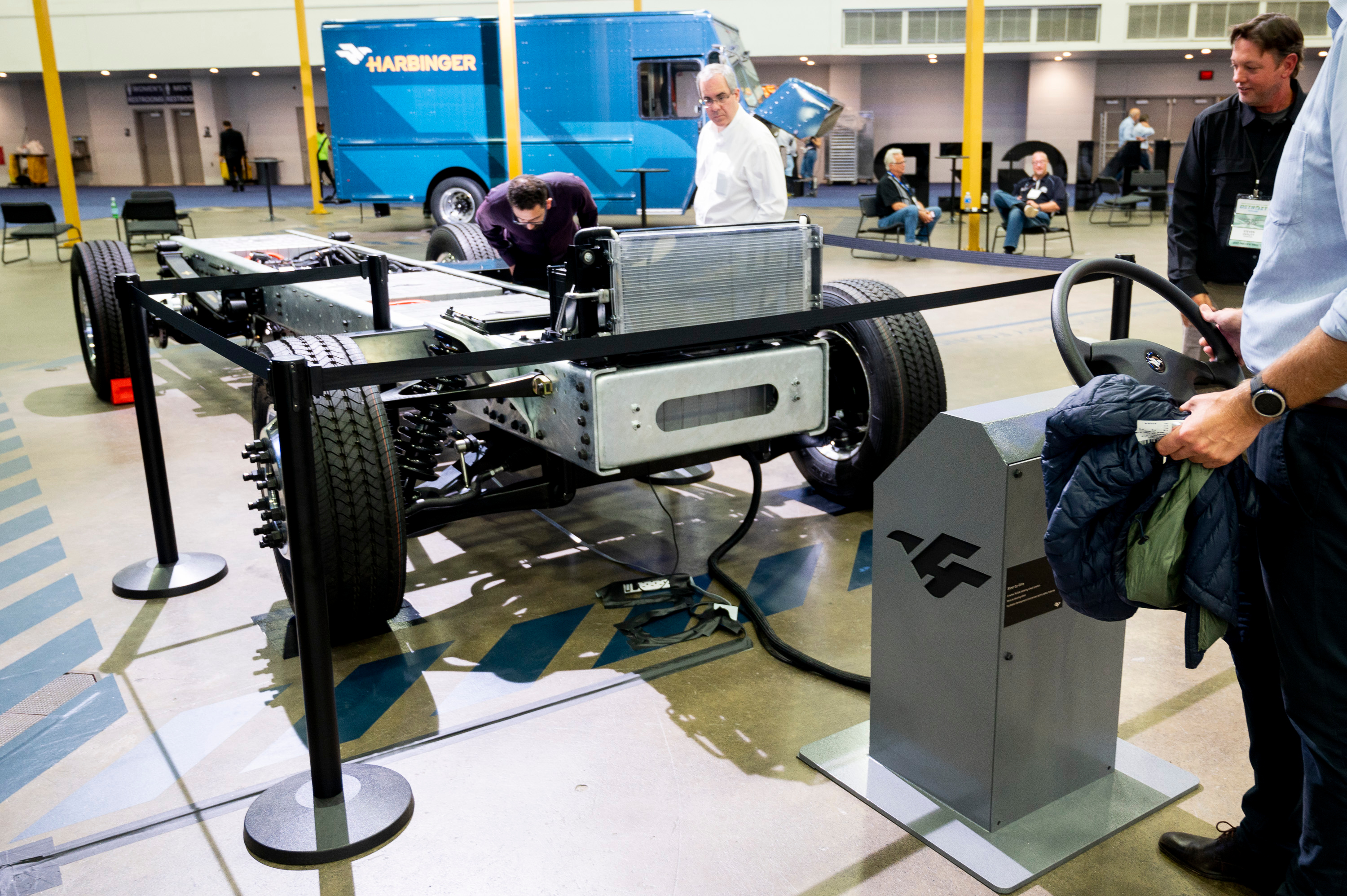 Guests can remotely steer a Harbinger truck chassis in the Harbinger booth during the 2022 North American International Auto Show at Huntington Place in Detroit on Wednesday, Sept. 14 2022.
