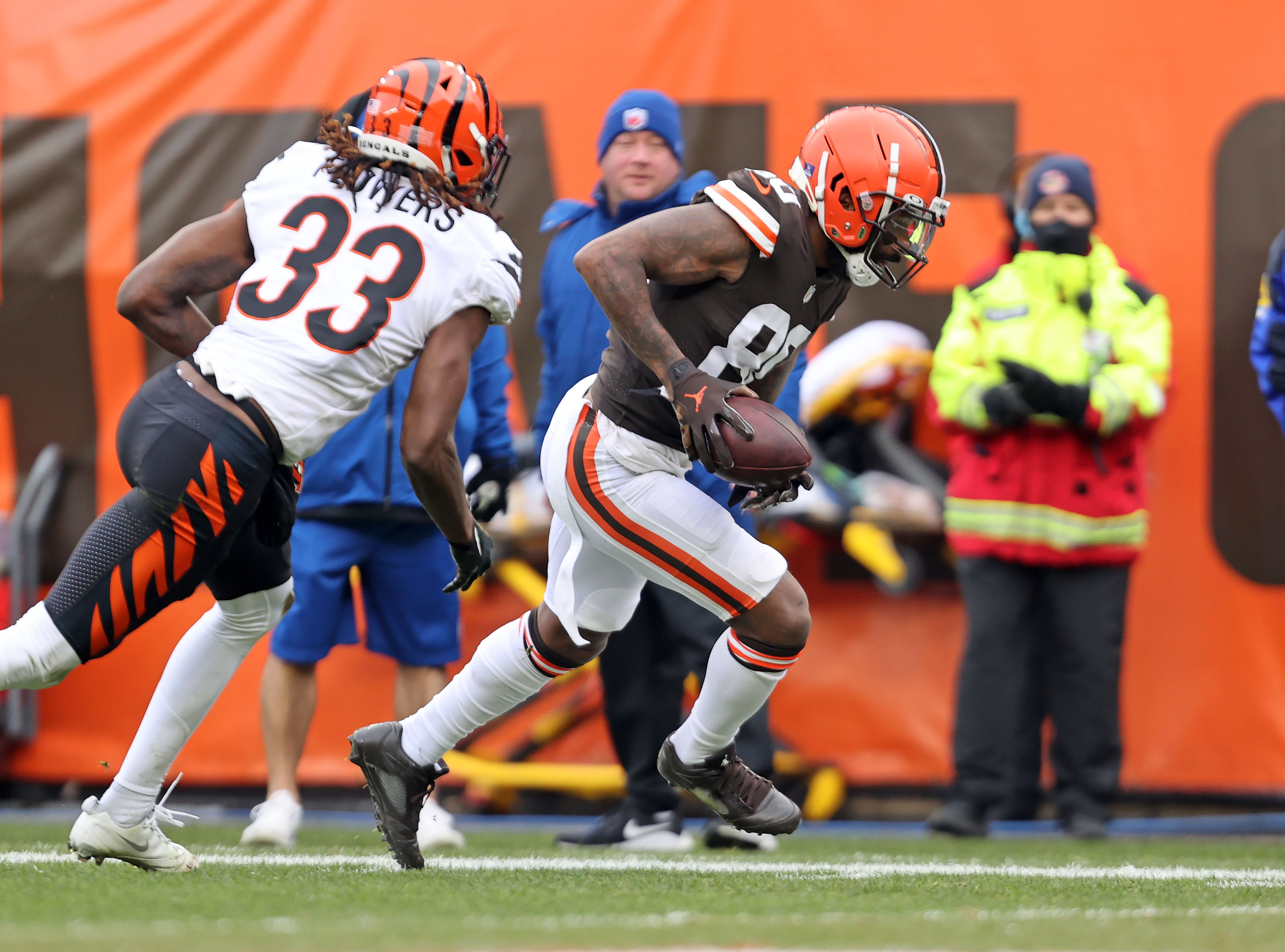 Cincinnati Bengals cornerback Tre Flowers (33) runs for the play