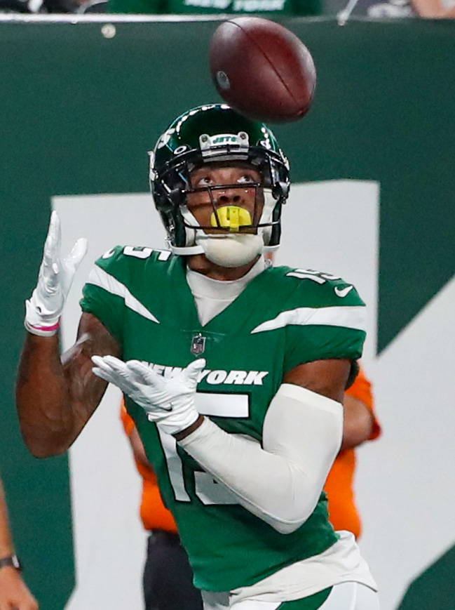 New York Jets quarterback James Morgan, below, is sacked by Philadelphia  Eagles' Matt Leo (64) and T.Y. McGill during the second half of an NFL  preseason football game Friday, Aug. 27, 2021