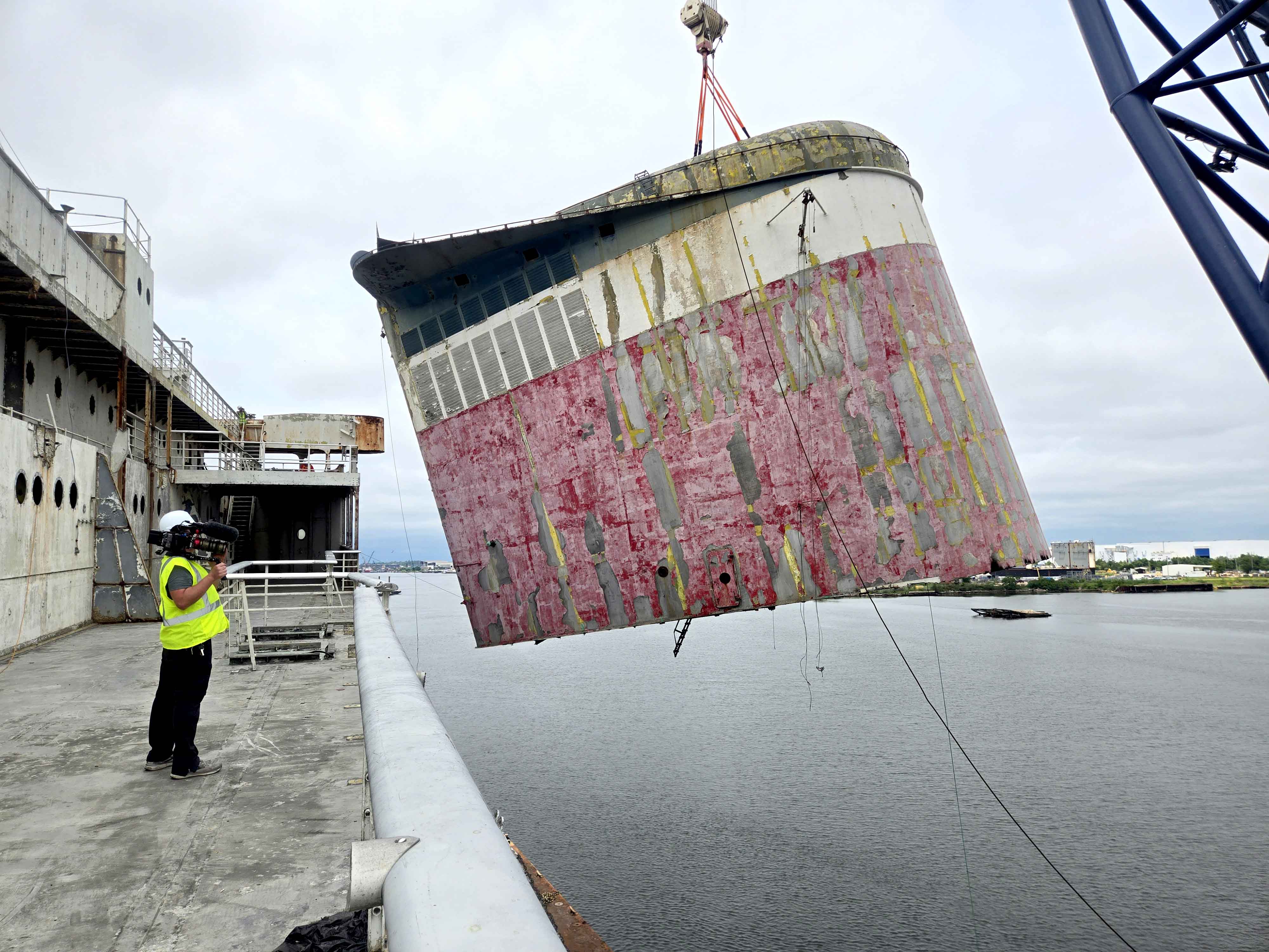 Historic ocean liner stripped of its giant stack. See what it'll