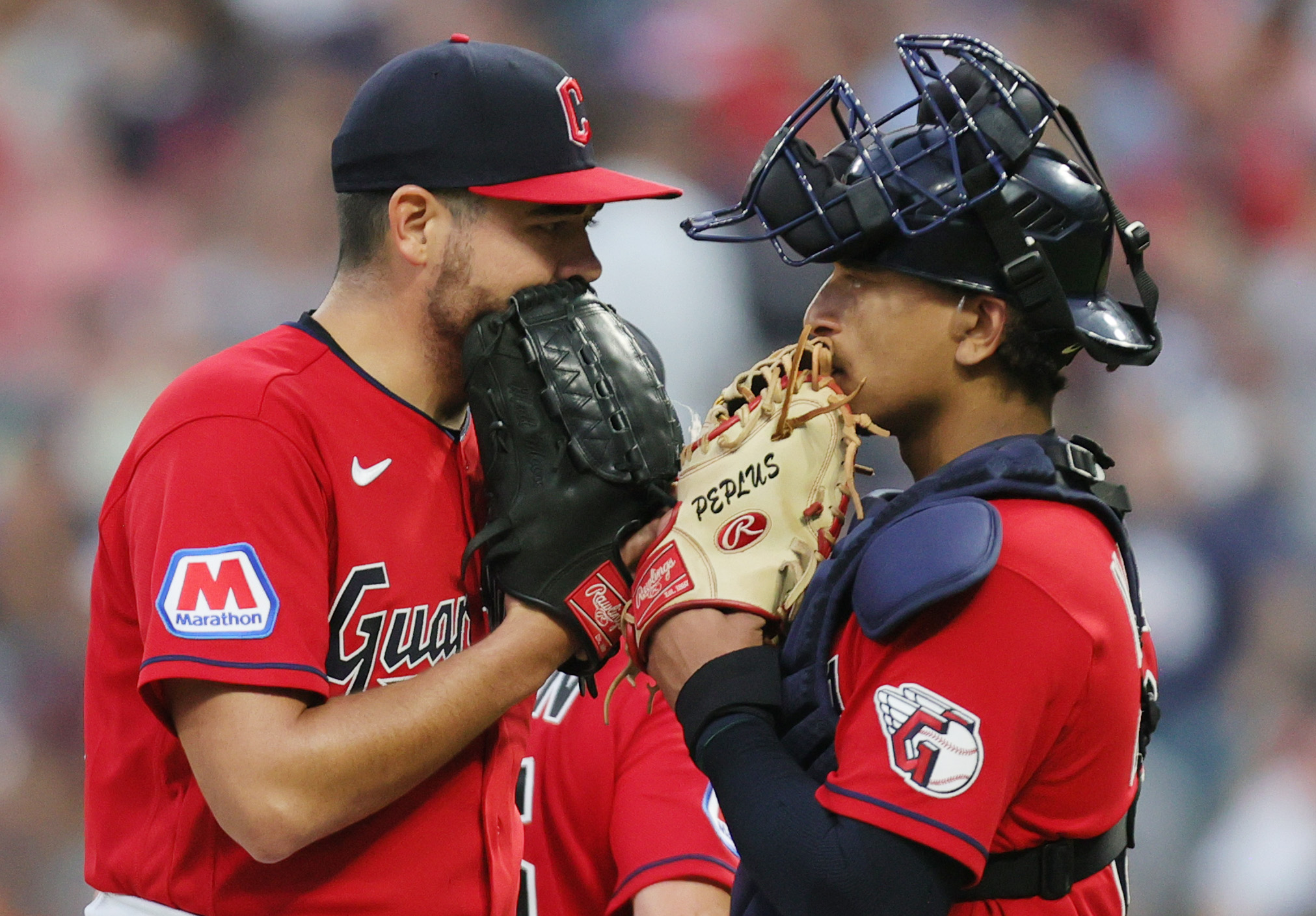 Cleveland Guardians relief pitcher Matt Moore confers with his Cather Cleveland Guardians catcher Bo Naylor in the sixth inning, September 2, 2023, at Progressive Field.