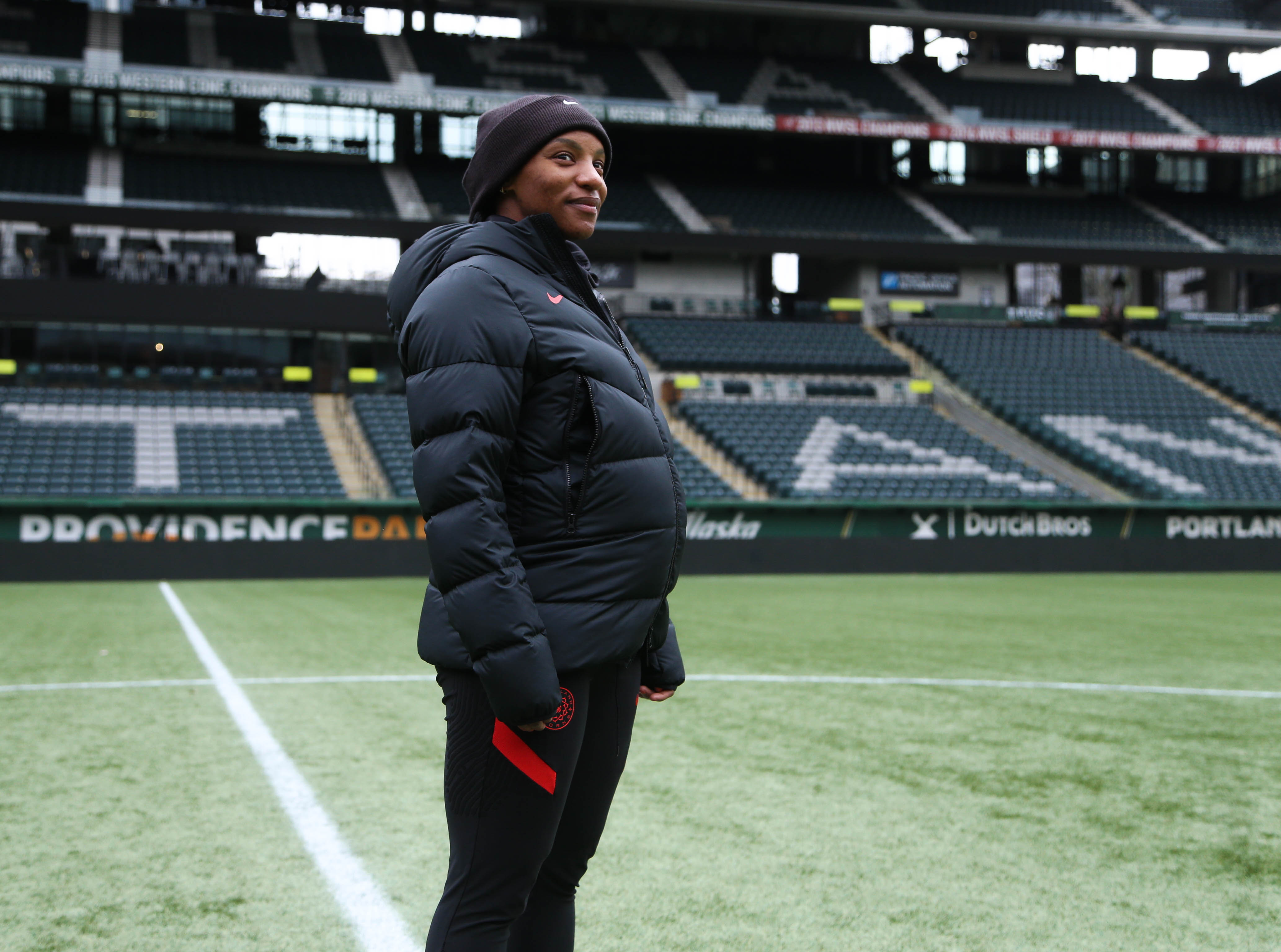 Portland Thorns midfielder Crystal Dunn practices while seven months