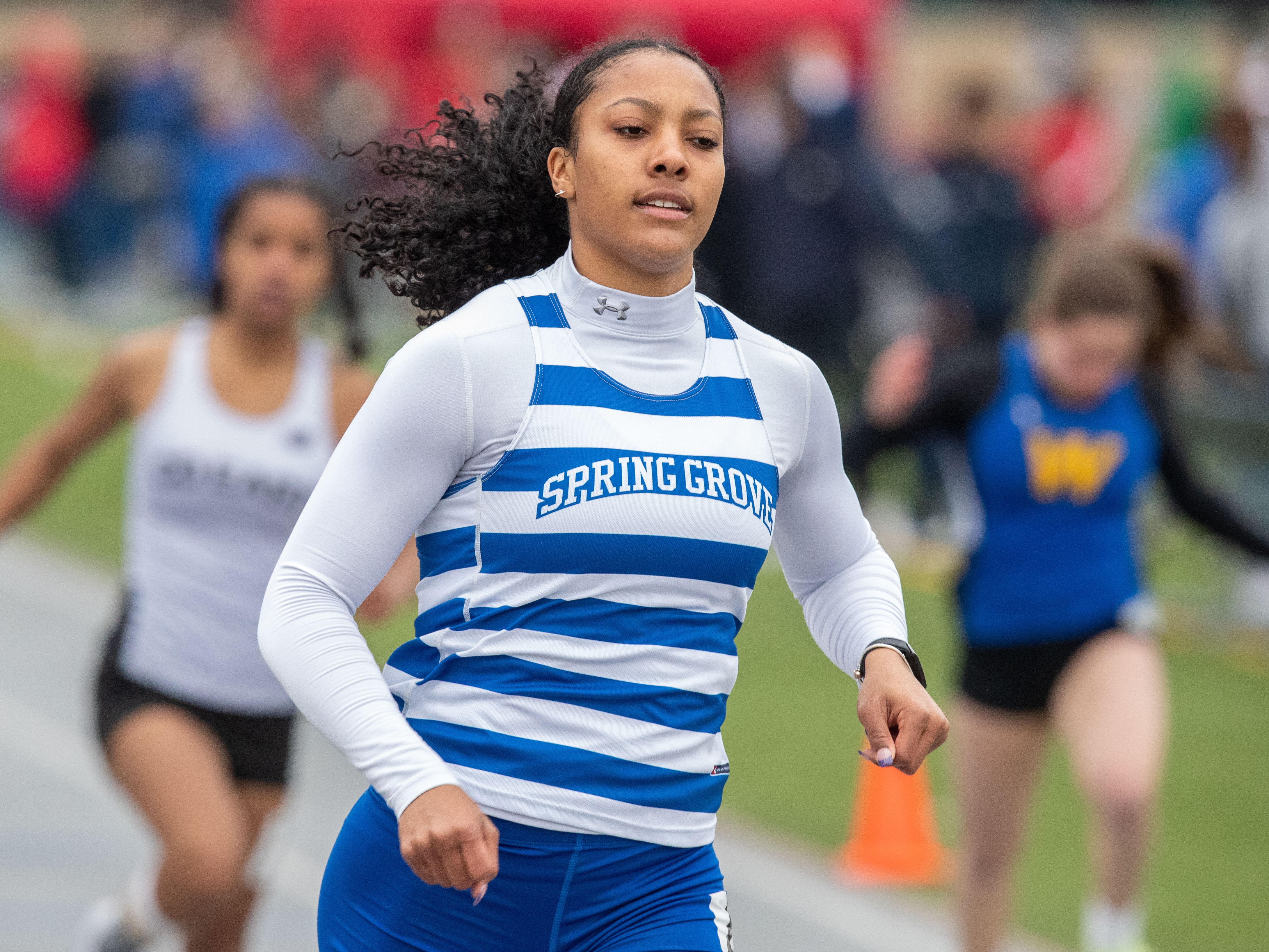 Laila Campbell, Spring Grove, easily wins the 100 meter dash, in 12.08, at the 2023 Tim Cook Memorial Invitational track & field meet at Chambersburg, Pa., Mar. 25, 2023.Mark Pynes | pennlive.com
