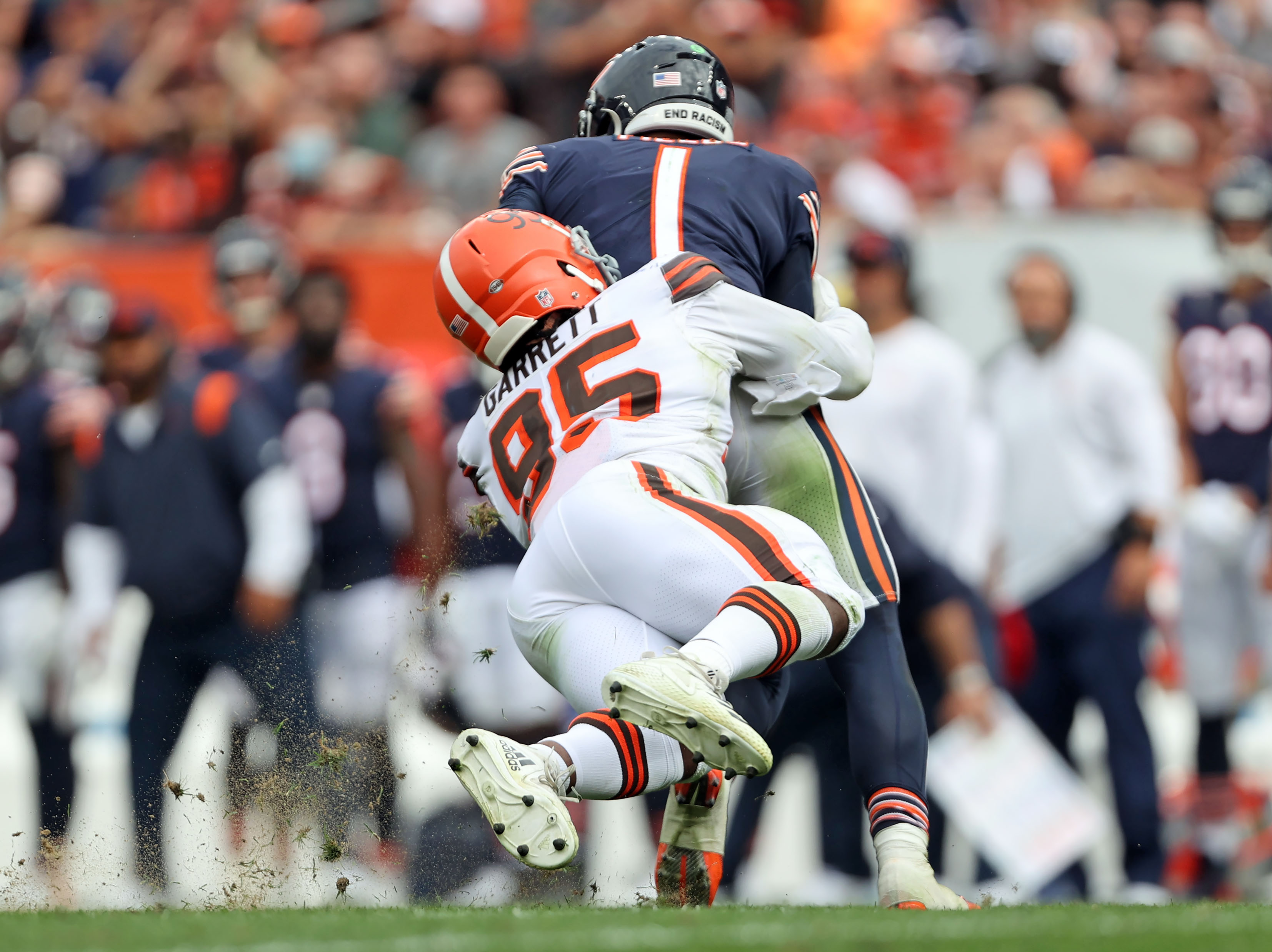 CLEVELAND, OH - SEPTEMBER 26: Cleveland Browns defensive end Myles Garrett  (95) and Cleveland Browns linebacker Jeremiah Owusu-Koramoah (28) sack  Chicago Bears quarterback Justin Fields (1) during the second quarter of the