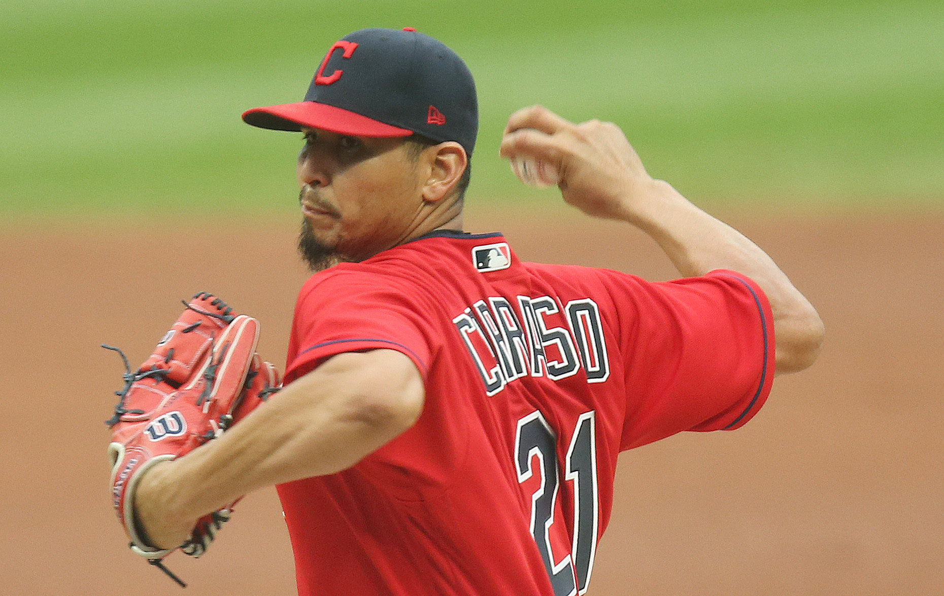 Cleveland Indians pitcher Zach Plesac catches the ball at first