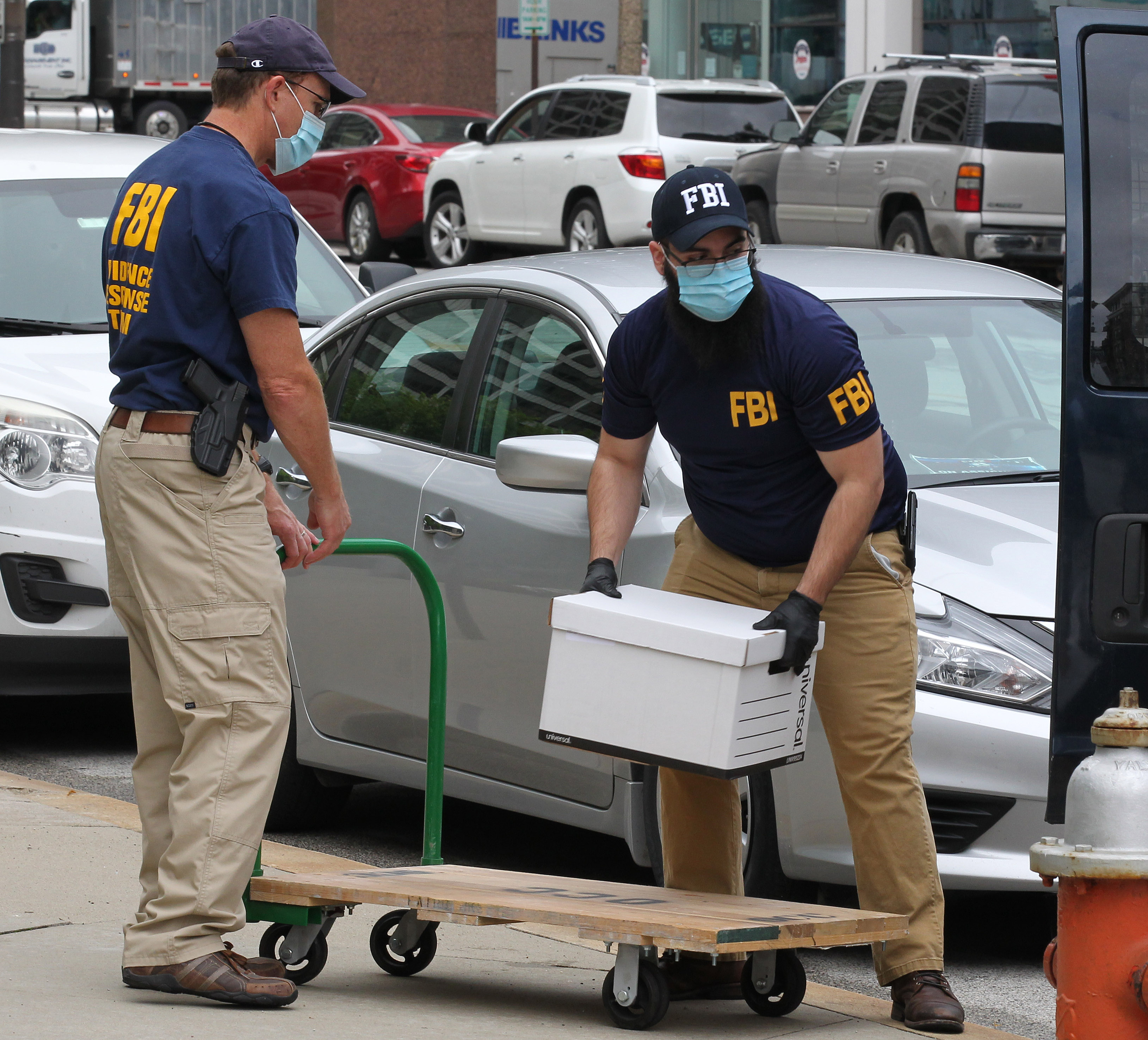 FBI raids the Cleveland offices of Optima Management Group with ties to ...