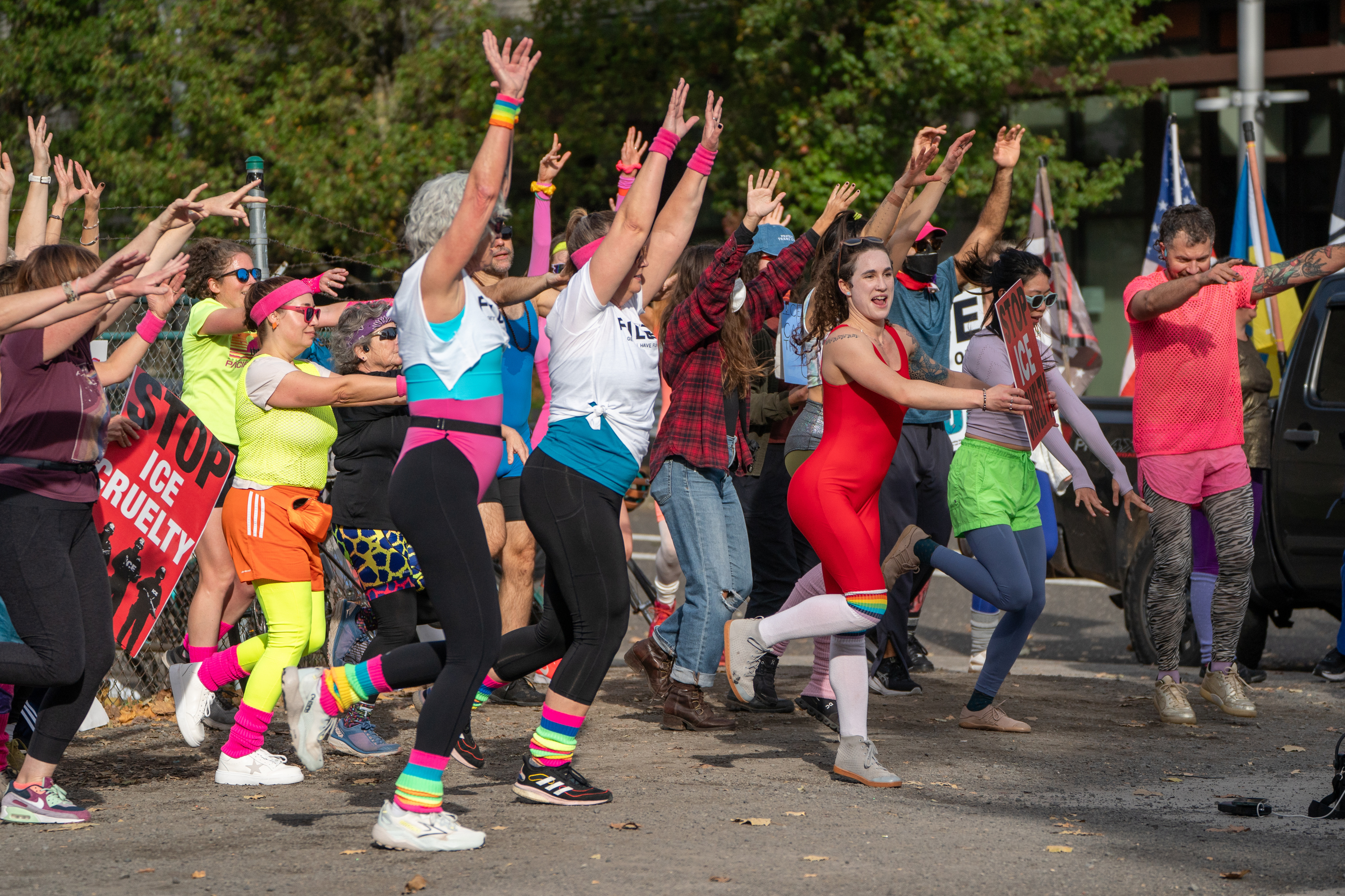 Participants in Fulcrum Fitness’s “Sweatin’ Out the Fascists” held an ’80s-aerobics peaceful protest outside the U.S. Immigration and Customs Enforcement (ICE) facility in South Portland on Sunday, Nov. 9, 2025, collecting donations for the Oregon Food Bank.