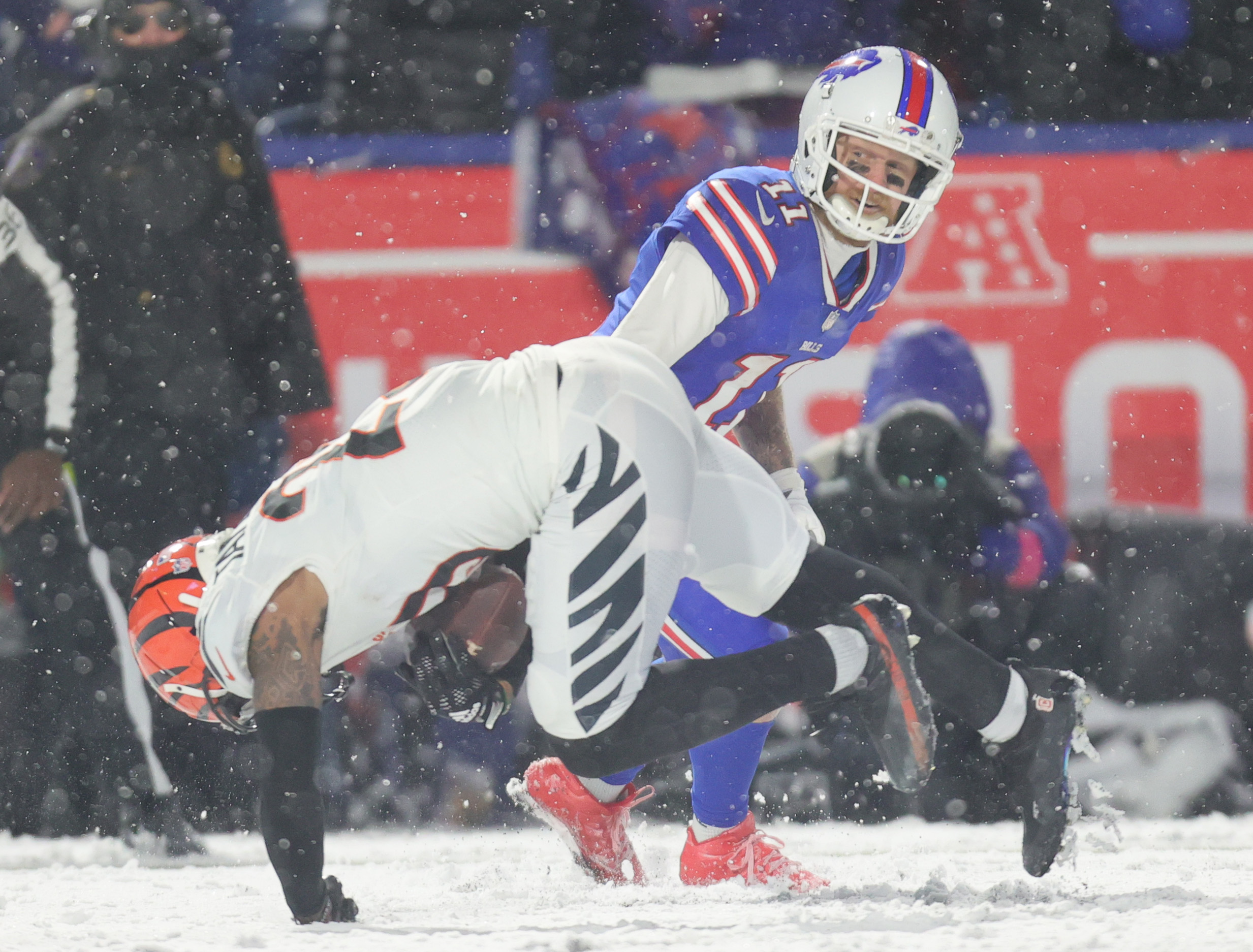 NFL playoffs: Joe Burrow, Bengals plow past Bills in snowy AFC divisional  game