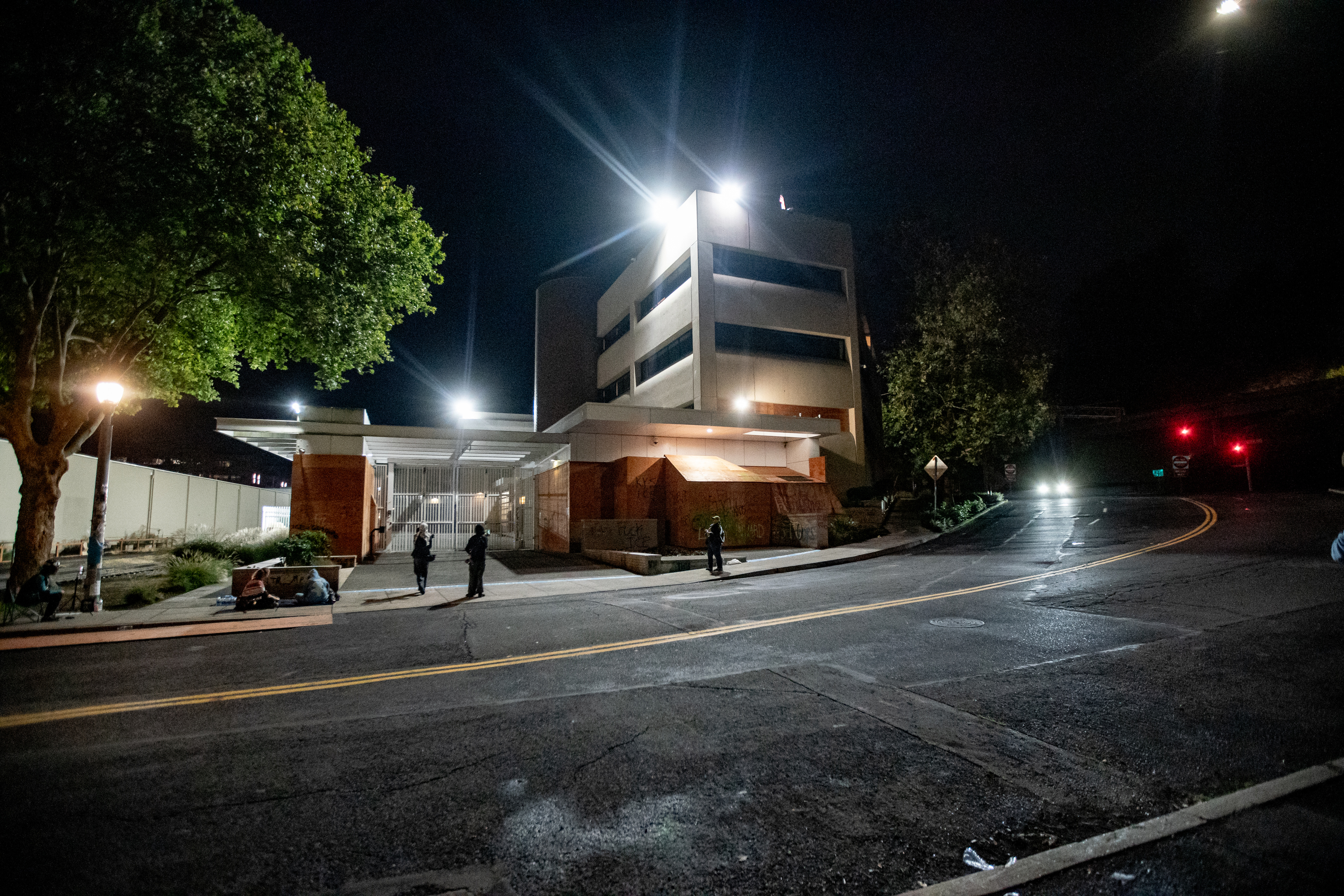 Protesters gather outside the boarded-up U.S. Immigration and Customs Enforcement building in South Portland on Monday, Sept. 8, 2025, days after President Donald Trump suggested federal intervention.