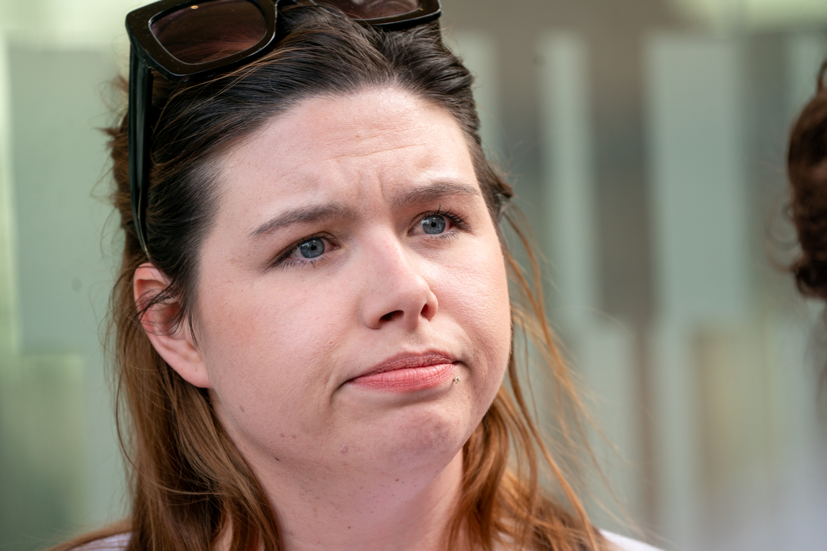 Families of victims react as prosecutors file new murder charge against ...