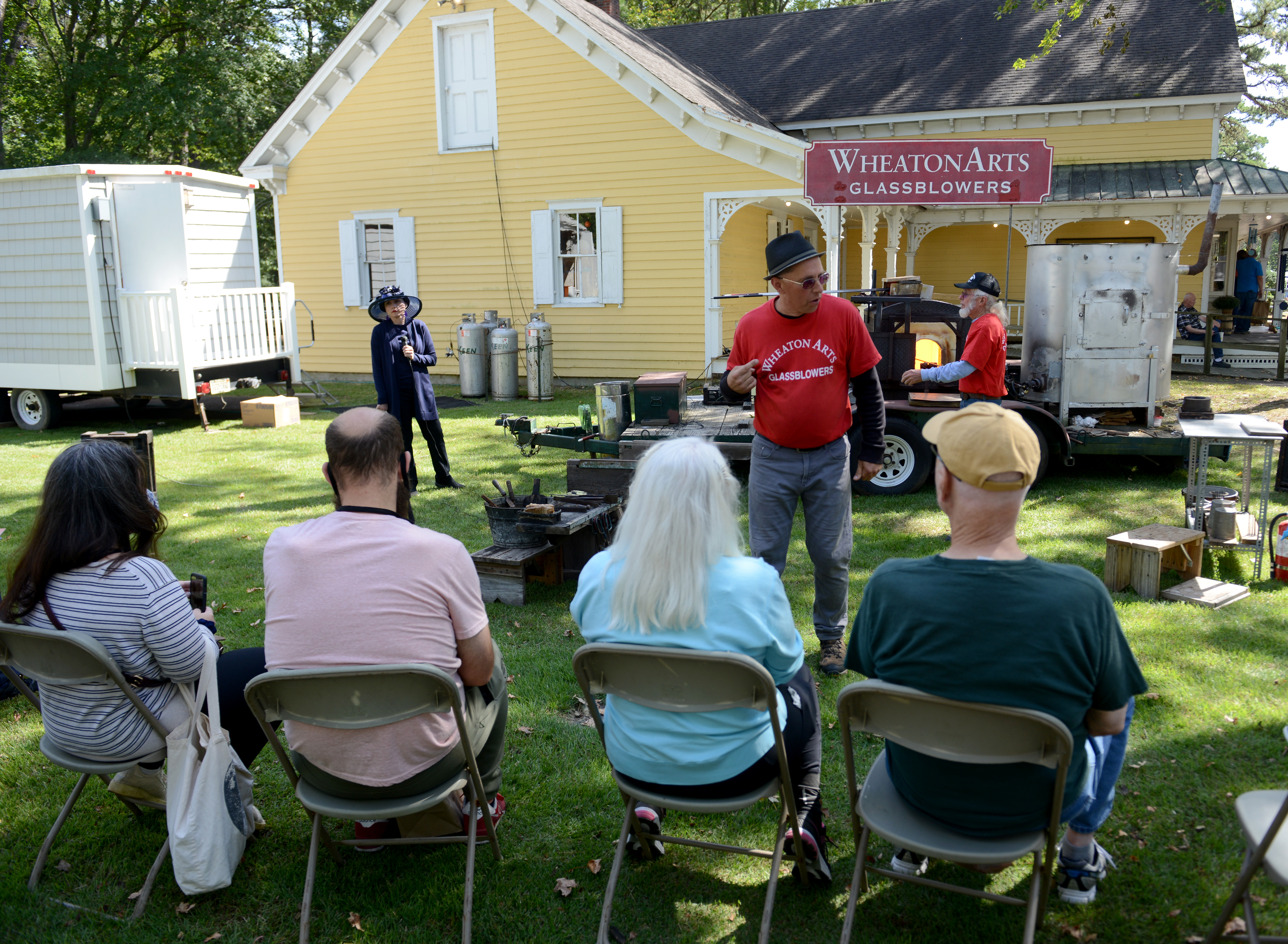 Wheaton arts Traveling Glassblowers give a glass bowling demonstration during the 22nd annual Festival of Fine Craft at Wheaton Arts in Millville, Saturday, Oct. 2, 2021.