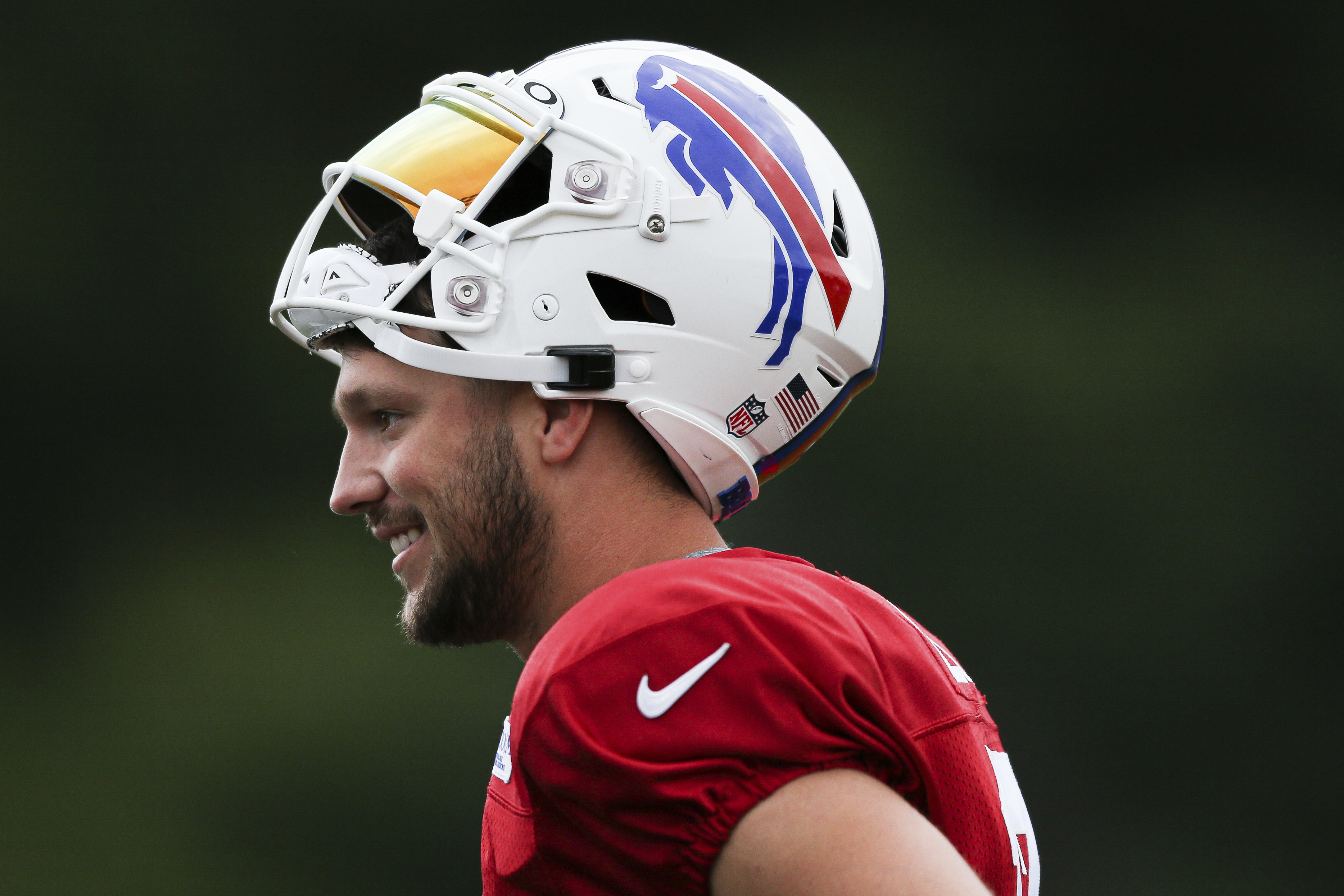 Fans draw similarities between Josh Allen's helmet and Giants gear after  Bills QB's look goes viral in training camp