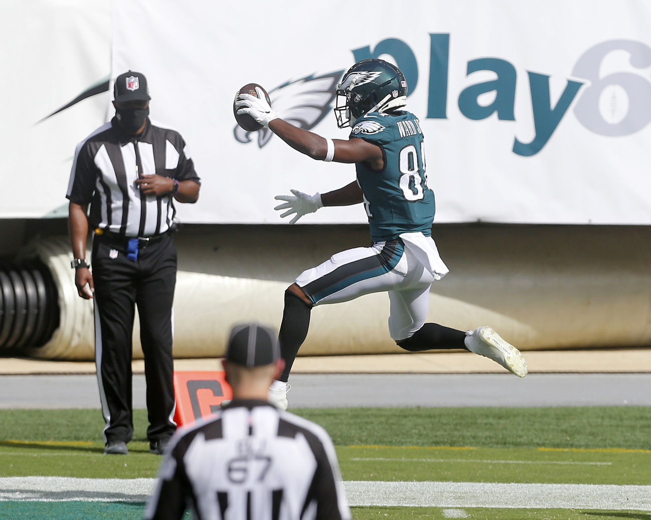 Philadelphia Eagles wide receiver John Hightower (82) runs onto