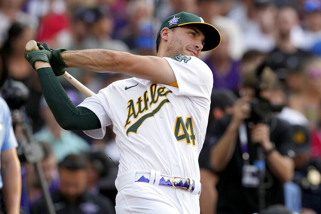 Matt Olson of the Oakland Athletics swings and watches the flight of