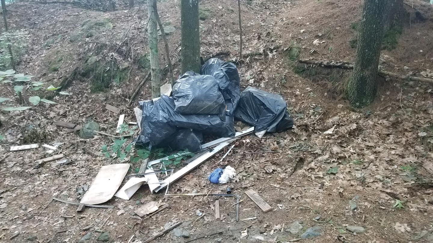 truckloads of dumped household trash in Monson