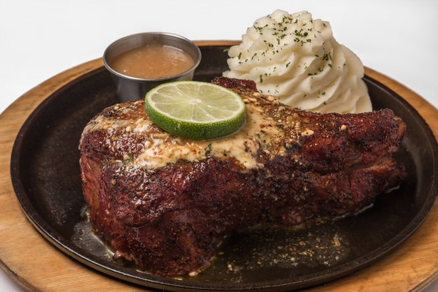 Perry s Steakhouse is serving its pork chop lunch for 79 cents to the first 100 guests on Friday al