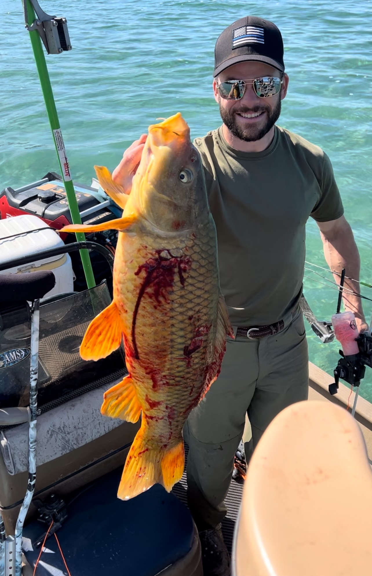 Bowfishers remove invasive koi from Glen Lake - mlive.com