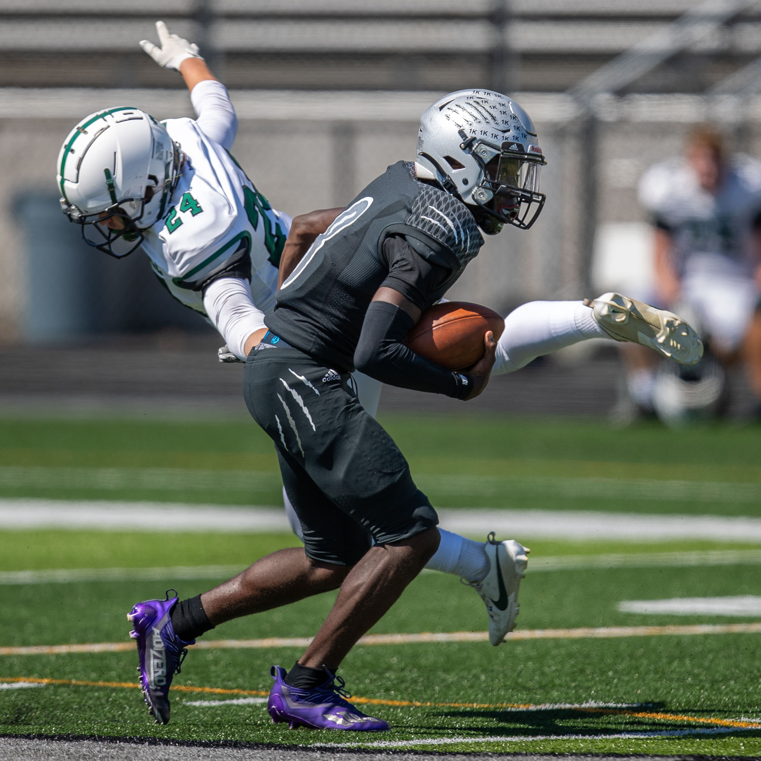 Carlisle meets Harrisburg in high school football action