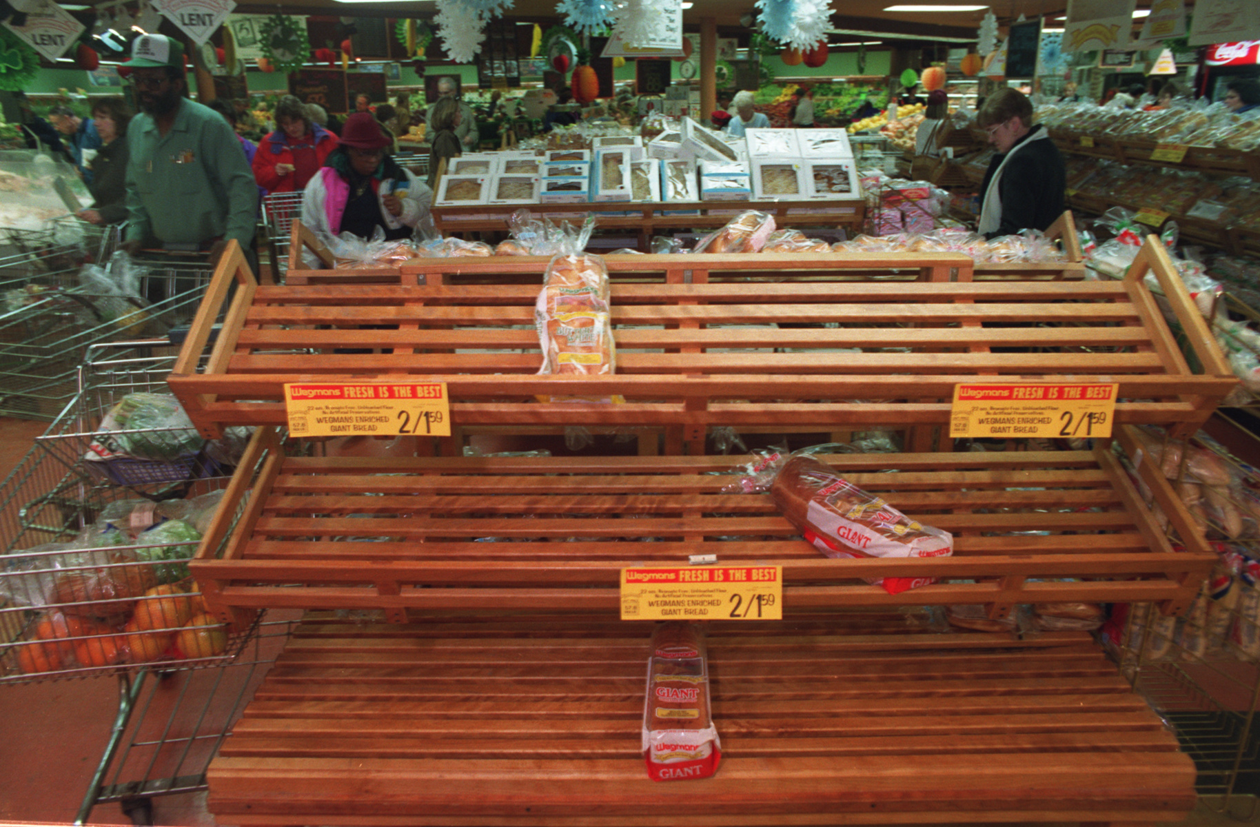 An empty bread rack in the bakery department at the DeWitt Wegmans on at 5 p.m. on March 11, 1993. People jammed the store, stocking up on food in the wake of the approaching "Storm of the Century."