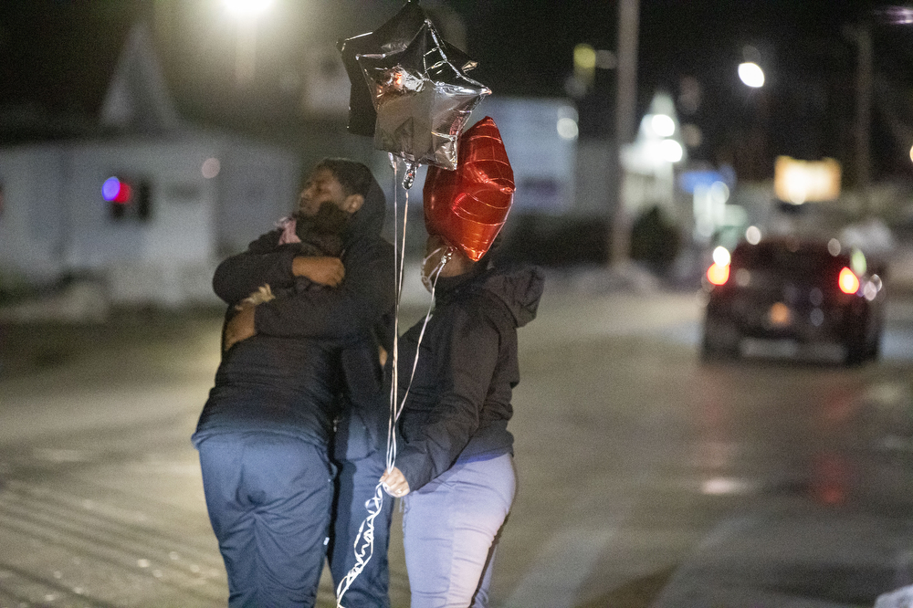 Family and friends of Xavier “Junior” King gather to release balloons outside the bar where he was shot and killed Sunday night in Harrisburg, Pa., Jan. 18, 2022.Mark Pynes | mpynes@pennlive.com