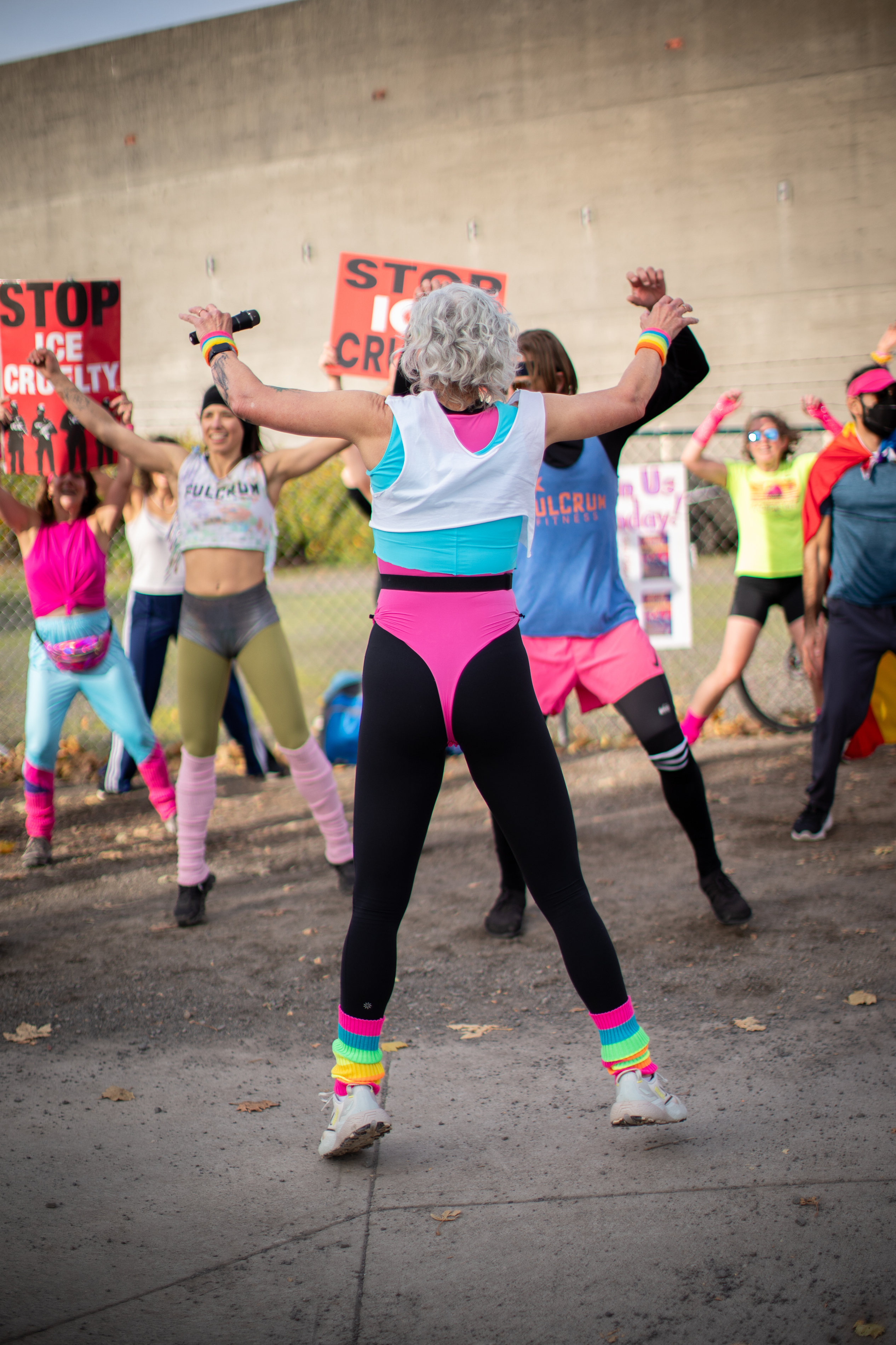 Participants in Fulcrum Fitness’s “Sweatin’ Out the Fascists” held an ’80s-aerobics peaceful protest outside the U.S. Immigration and Customs Enforcement (ICE) facility in South Portland on Sunday, Nov. 9, 2025, collecting donations for the Oregon Food Bank.