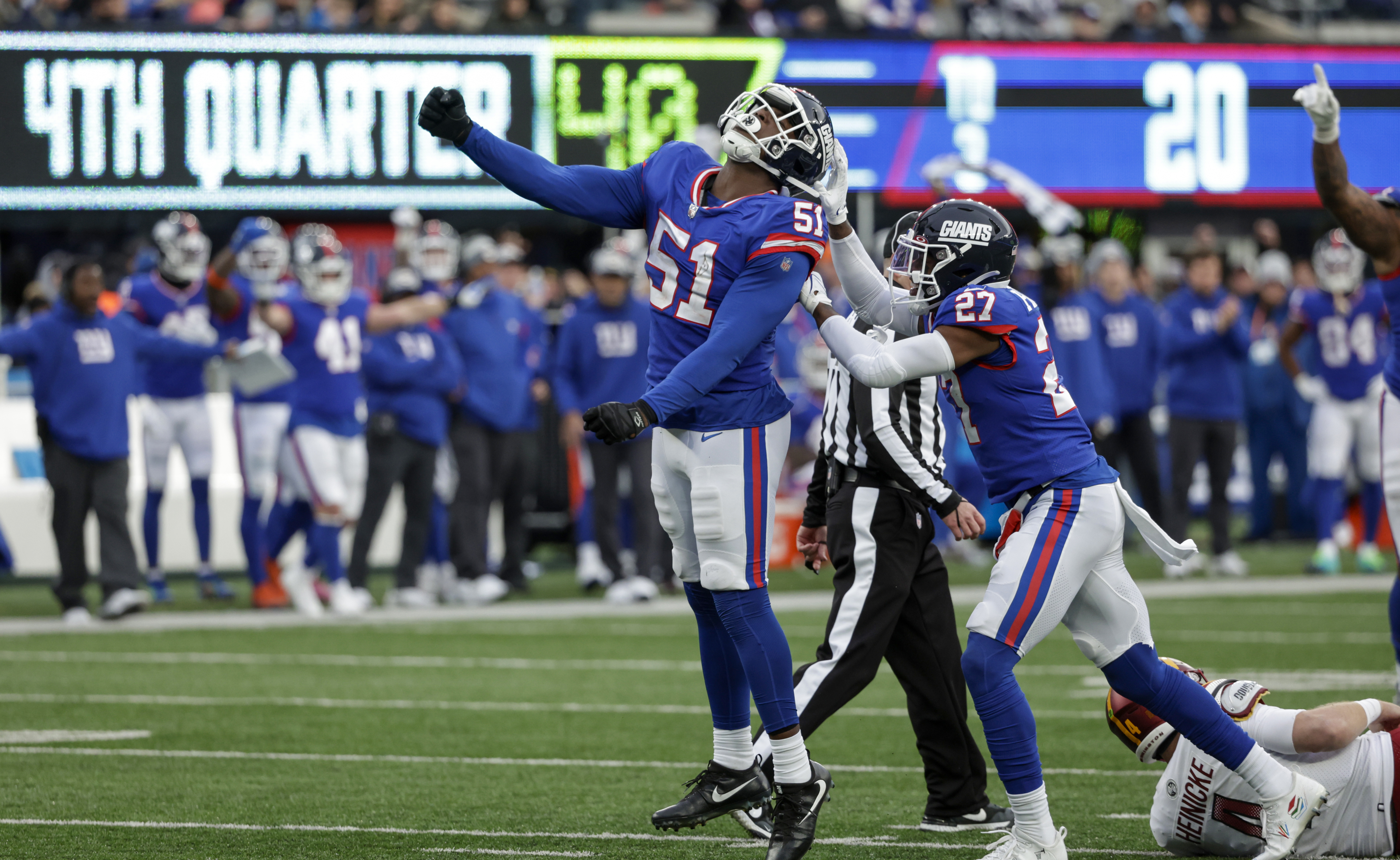 New York Giants wide receiver Richie James (80) runs with the ball against  the Washington Commanders during an NFL football game Sunday, Dec. 4, 2022,  in East Rutherford, N.J. (AP Photo/Adam Hunger