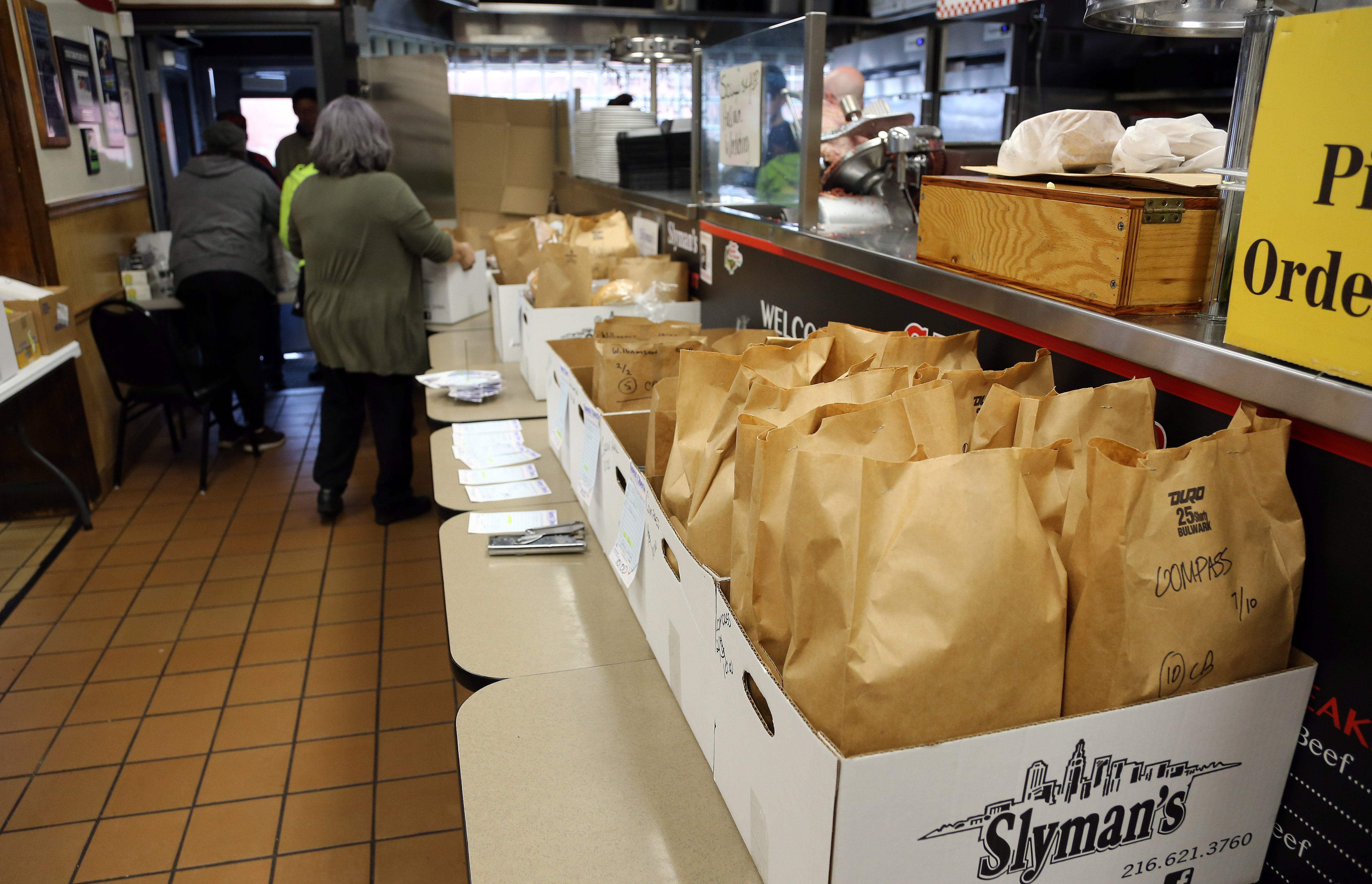 Fans of Slyman's corned beef wait in line despite Coronavirus concerns ...