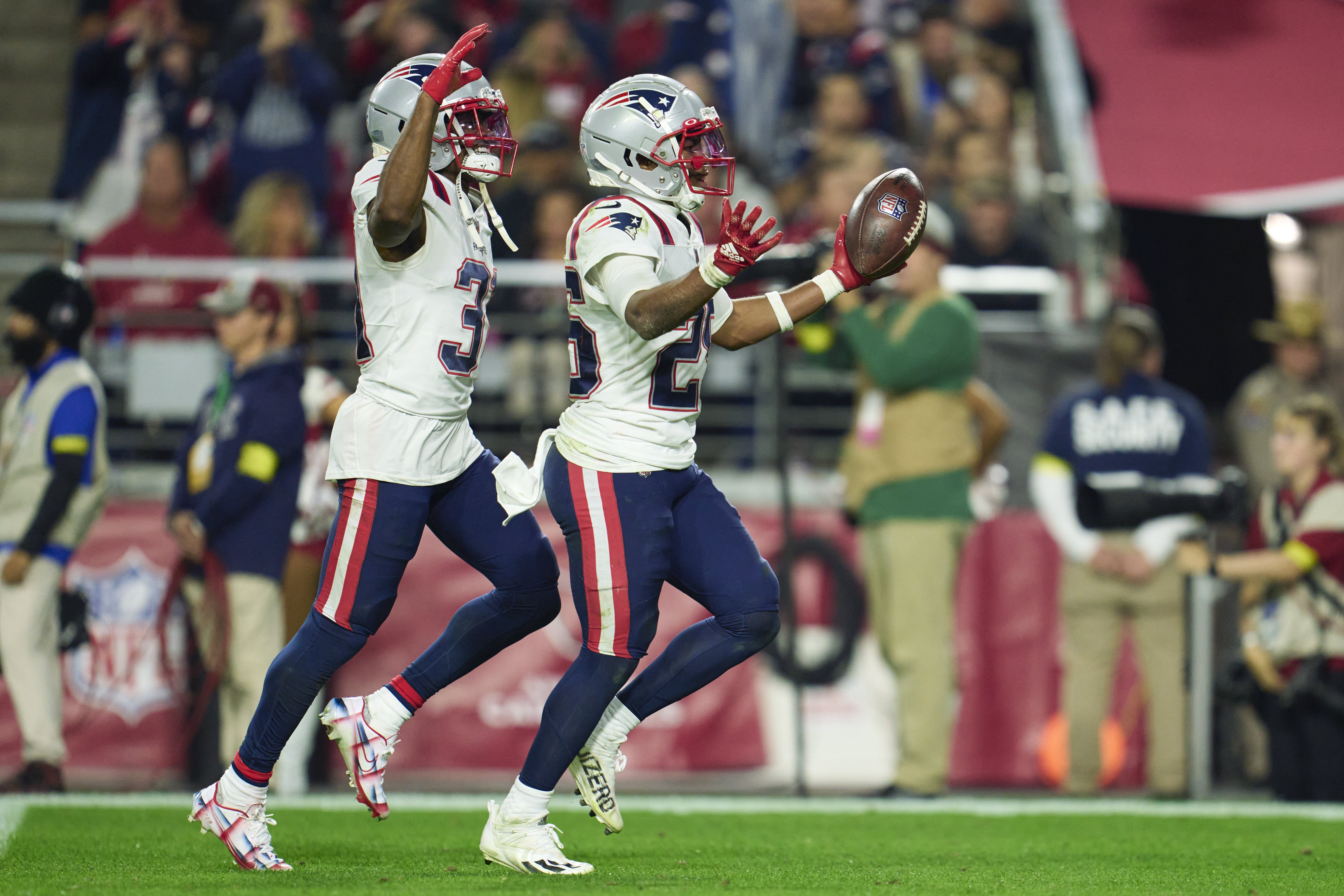 Jack Jones of the New England Patriots celebrates after an in